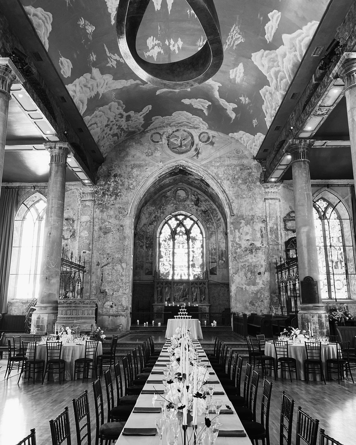 Both sleek &amp; fabulous as the main table lead to the champagne fountain underneath @themountwithout_events giant infinity installation. What a venue! The black ones are chocolate cosmos Xx

&bull; Three years of planning, the styling, and the coor