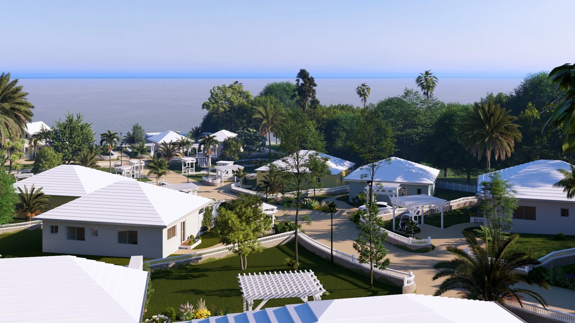 Turtle Bay Eleuthera Bahamas homes and building lots for sale. Aerial view of a coastal residential area with white houses, green trees, and palm trees, overlooking the ocean in the background.
