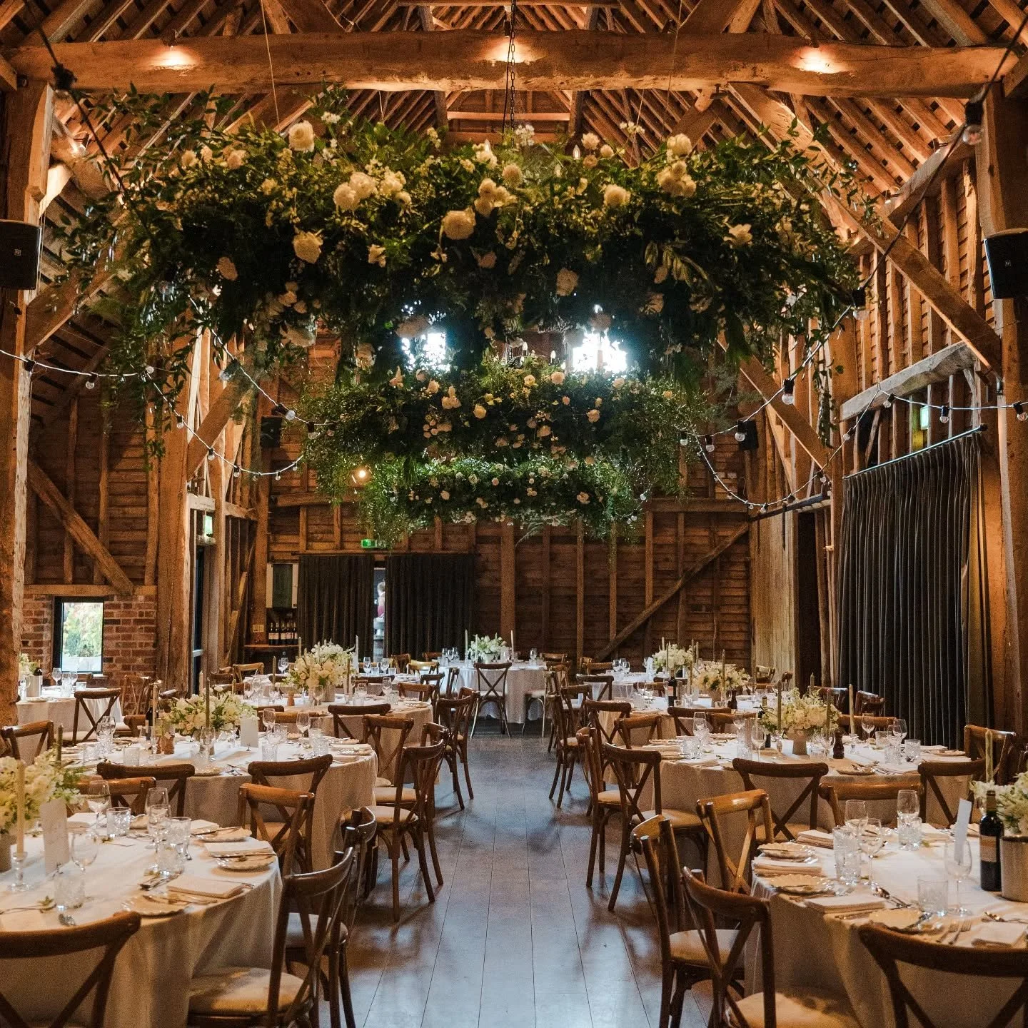 Three statement flower clouds to create that wow factor moment as guests enter the reception space. 🌿😍 These work perfectly in the stunning barn @barnsatredcoats 

We've got some beautiful 2026 weddings coming up at this fab venue! We are proud to 