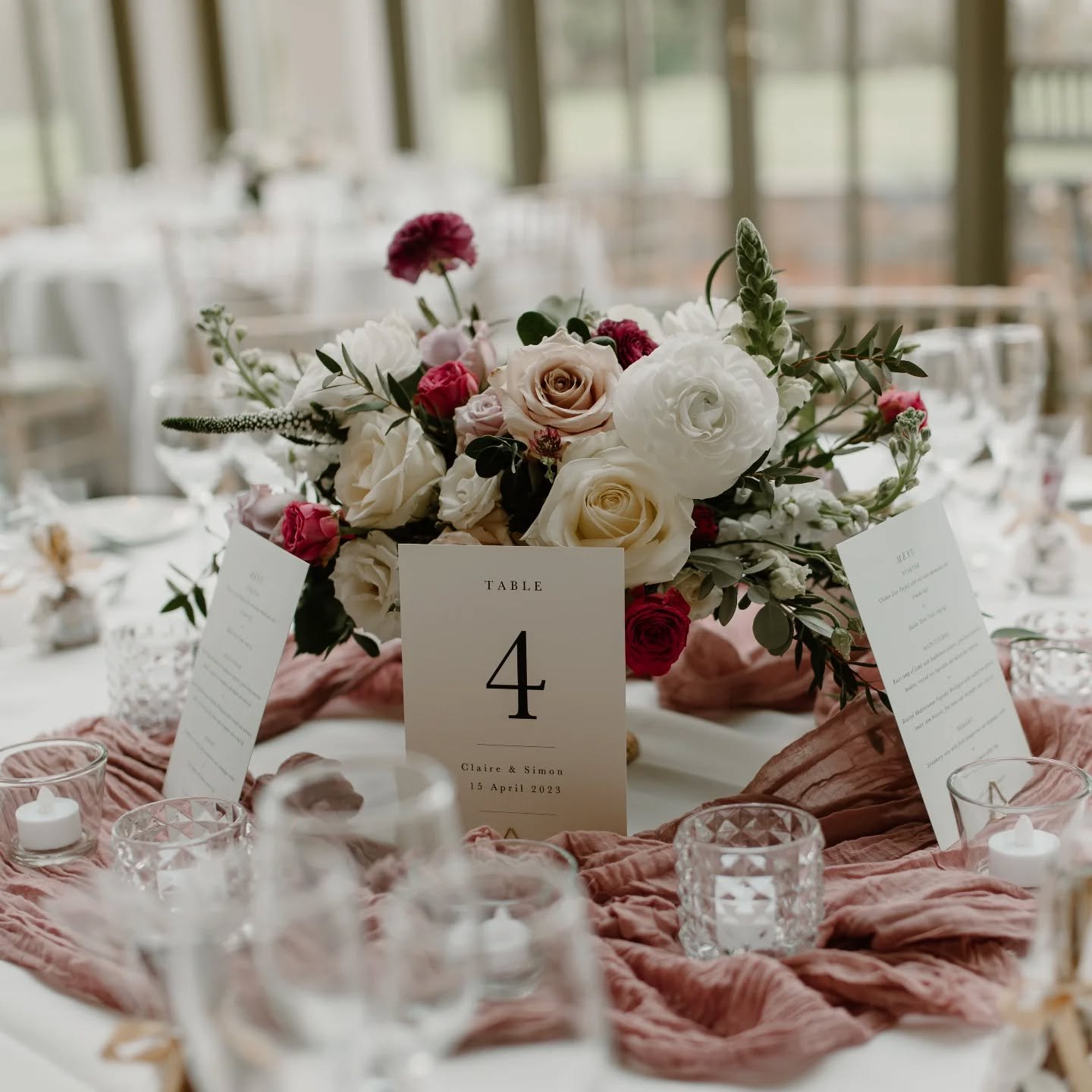 Reception in the light &amp; airy conservatory space @offleyplace 

A footed bowl table arrangement with a beautiful mix of neutrals, lilacs and pops of berry/wine tones 😍 

Photo @clare_smith_photography 

#hertfordshirewedding
#manorhousewedding
#