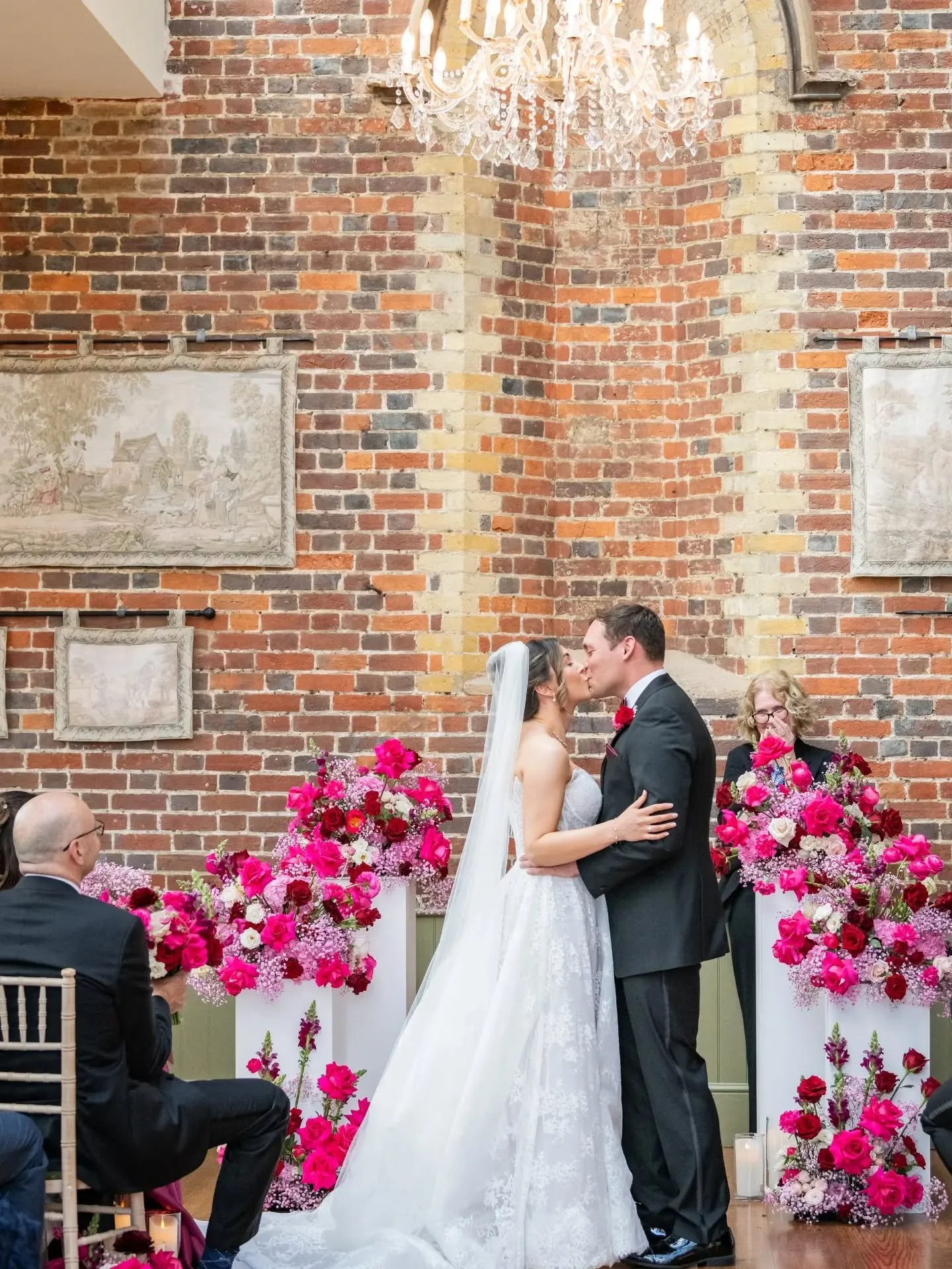 A beautiful bold colour scheme for this lovely wedding @offleyplace 

Gorgeous bright raspberry tones with a hint of red &amp; lots of fluffy pink Gyp. The perfect pop against the gorgeous exposed brickwork in the conservatory 

Photo @lyndseychallis