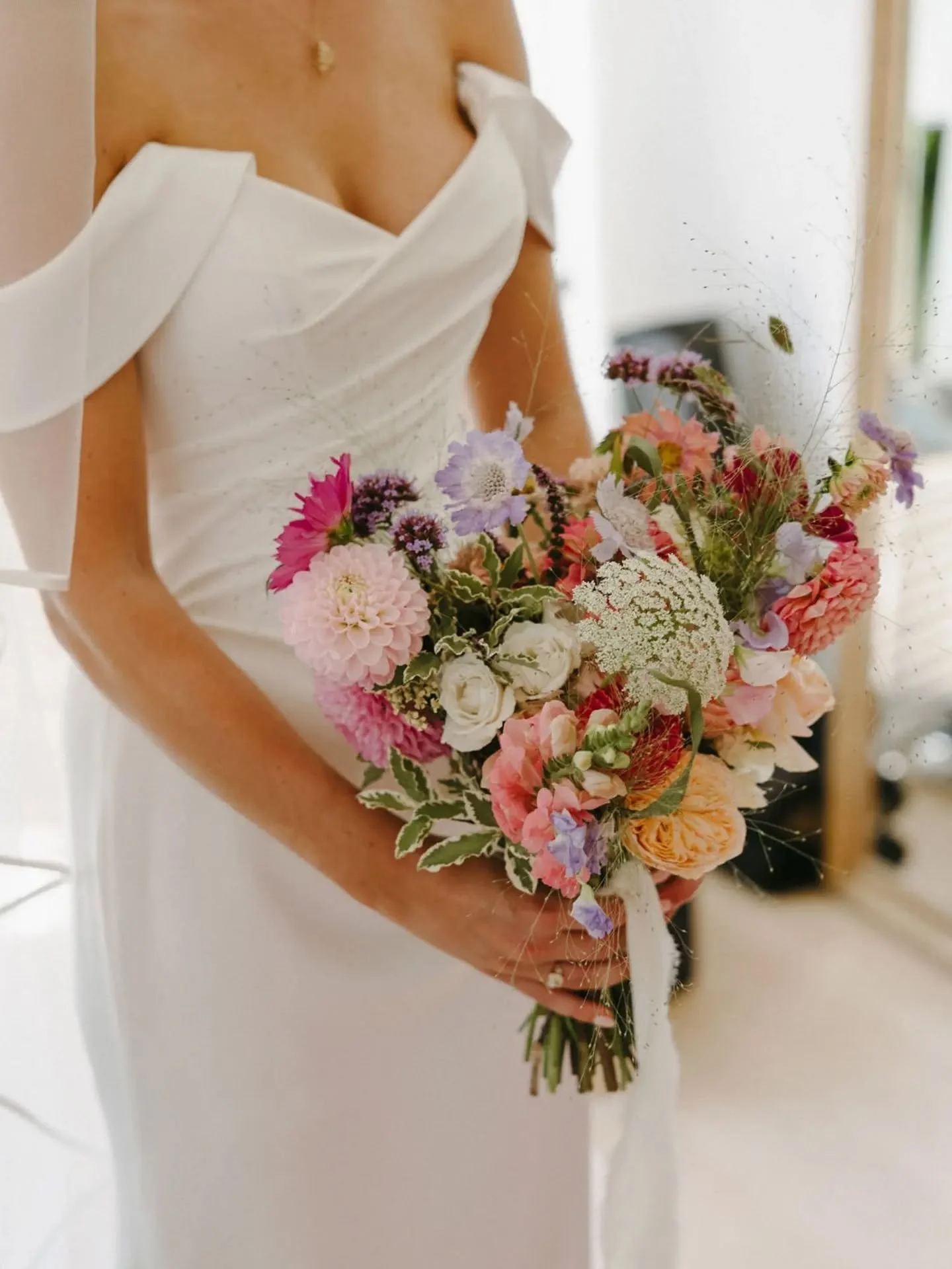 A gorgeous mix of British blooms for Sacha's bridal bouquet. Such a pretty colour palette alongside the pop of cerise pink bridesmaid dresses 💕

Summer 2027 is already looking like busy one, so if you're looking for a florist, please do get in touch
