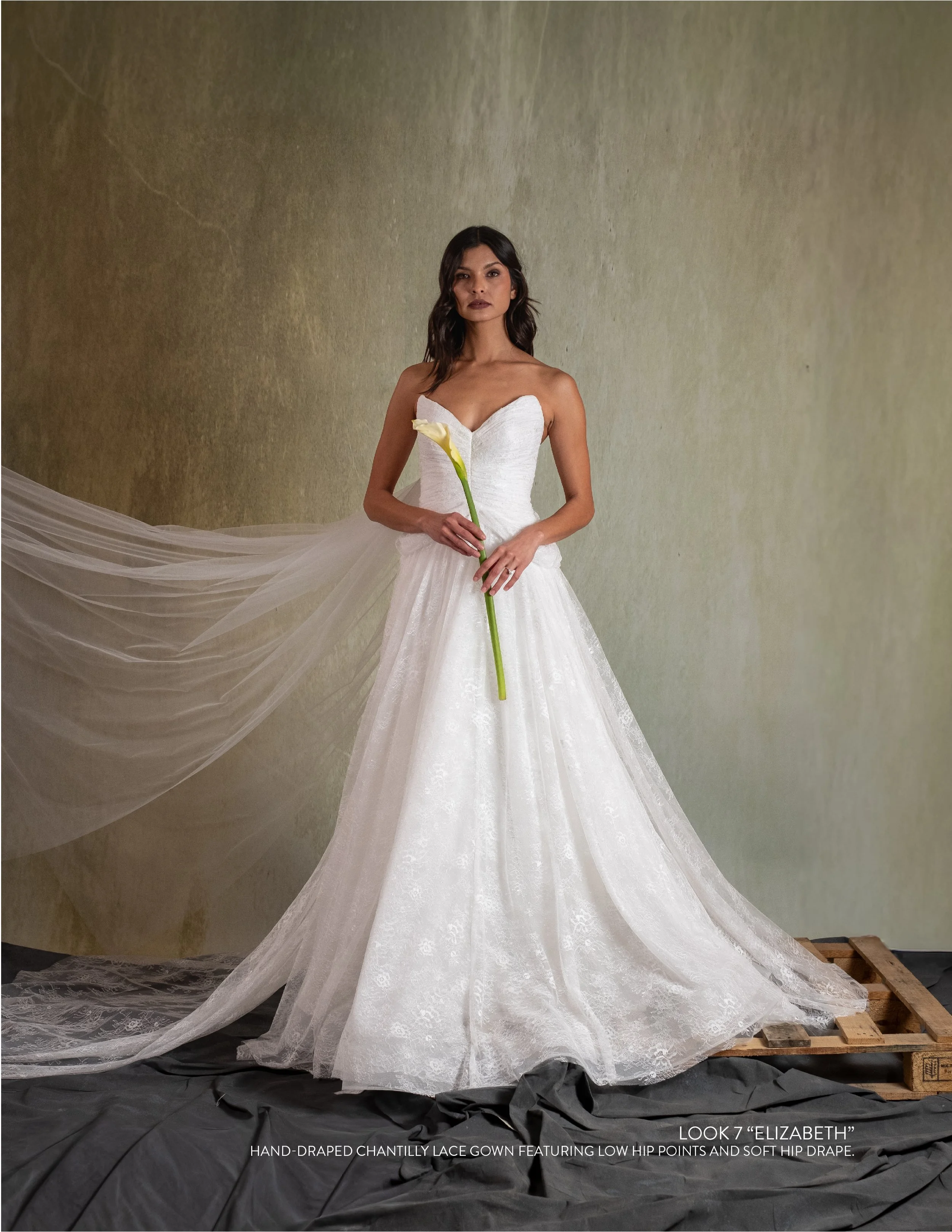 ELIZABETH GOWN - Hand-Draped chantilly lace gown featuring low hip points and soft hip drape.