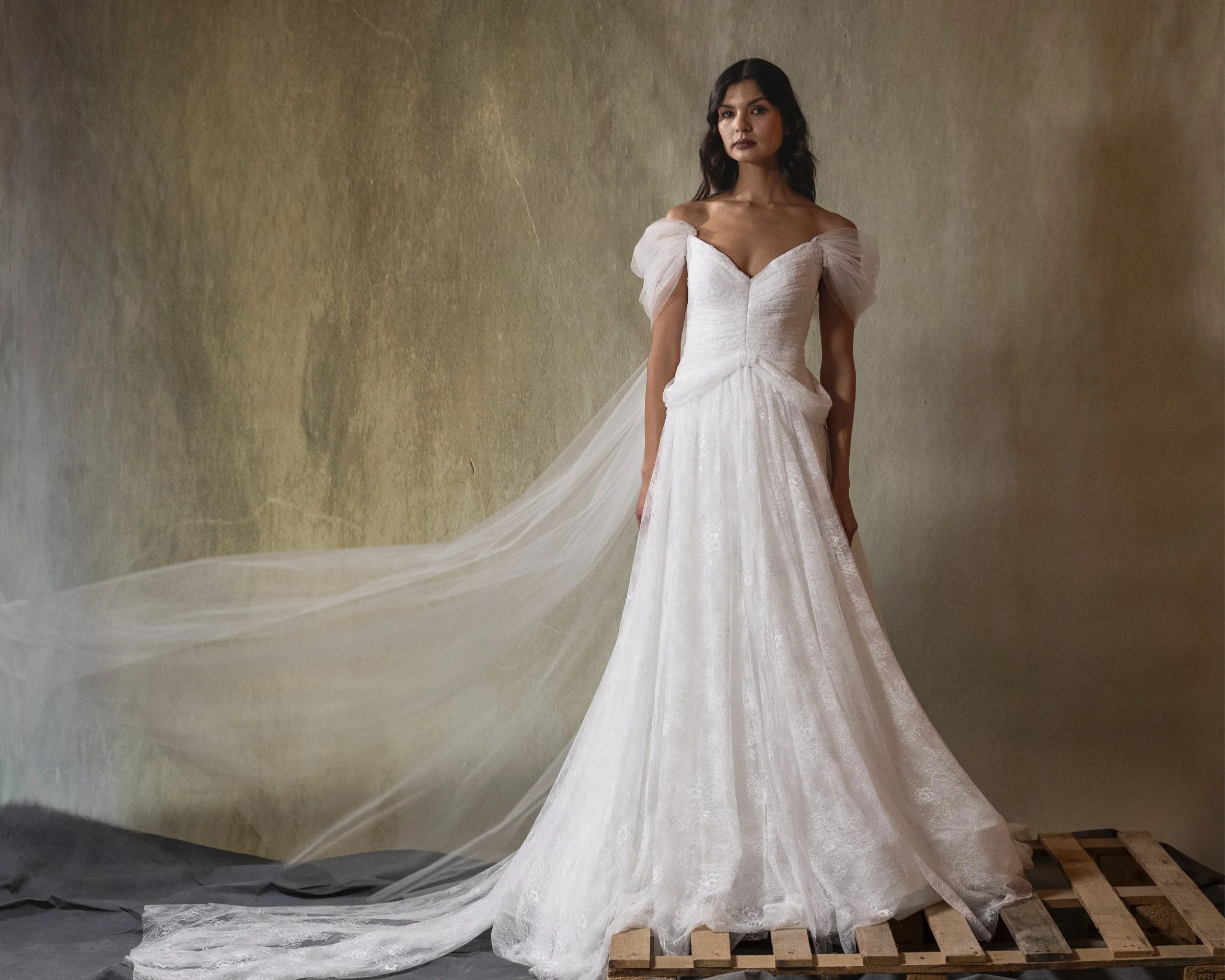 ELIZABETH GOWN - Hand-Draped chantilly lace gown featuring low hip points and soft hip drape.