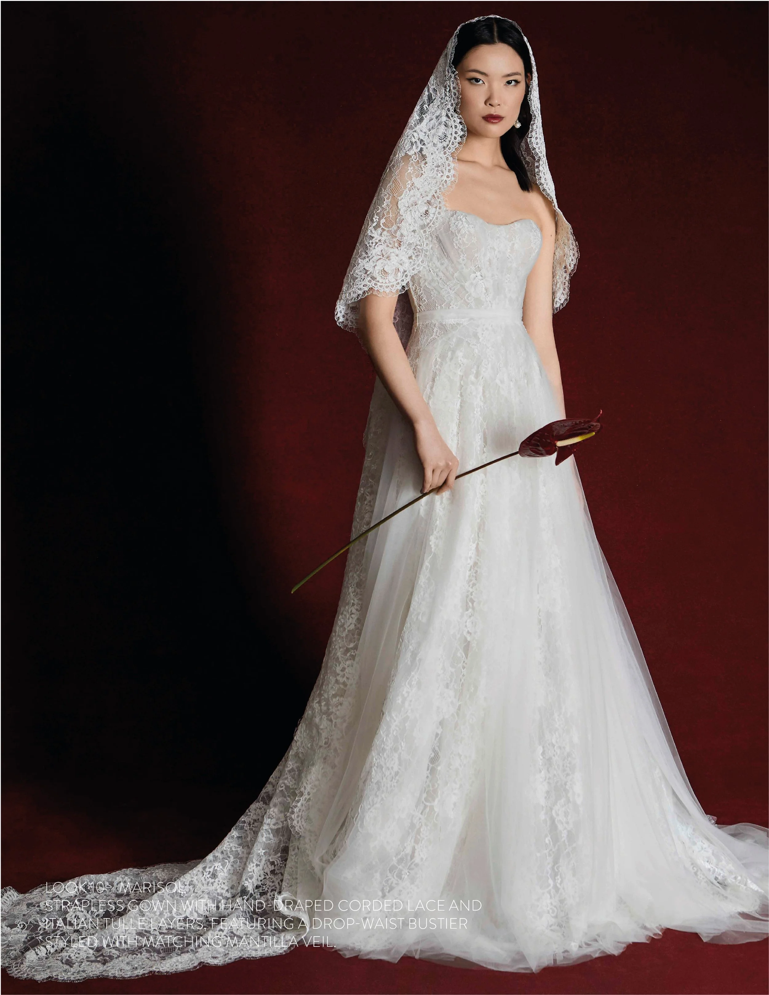 MARISOL GOWN - Strapless gown with hand draped corded lace and italian tulle over layers featuring drop waist bustier. 