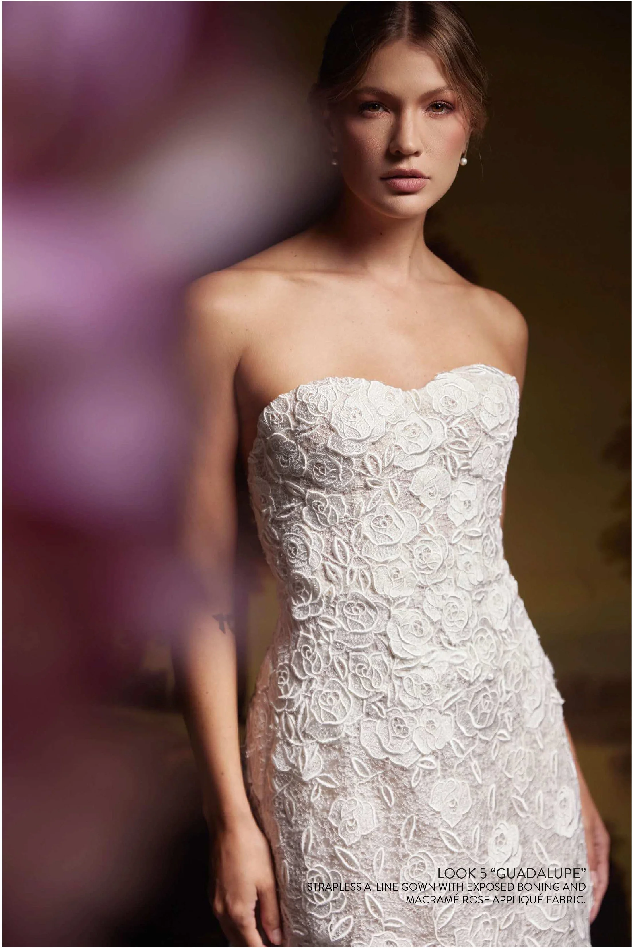 GUADALUPE GOWN - Strapless A line gown with exposed boning and macrame rose appliqué fabric.