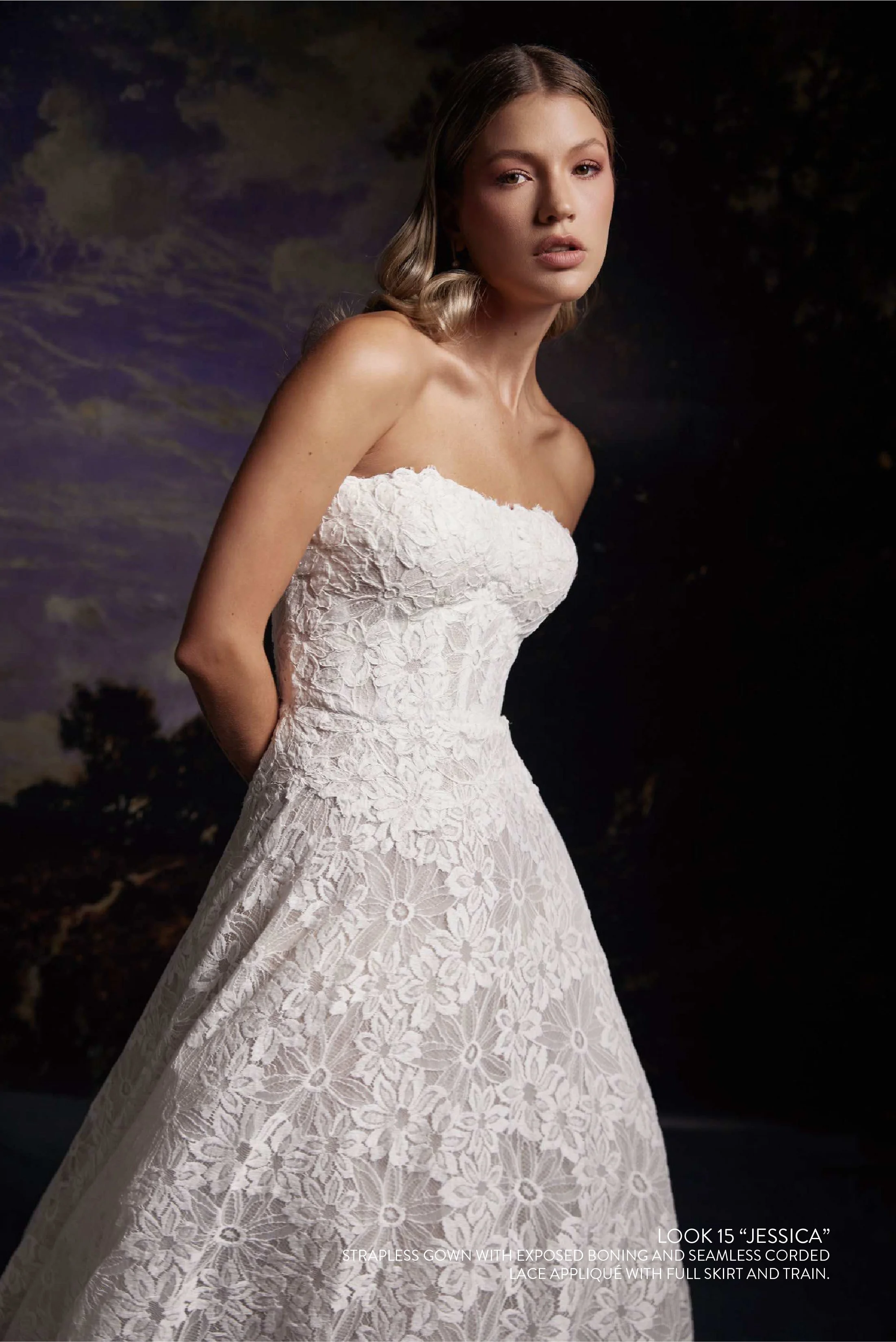JESSICA GOWN - Strapless gown with exposed boning and seamless corded lace appliqué with full skirt and train. 