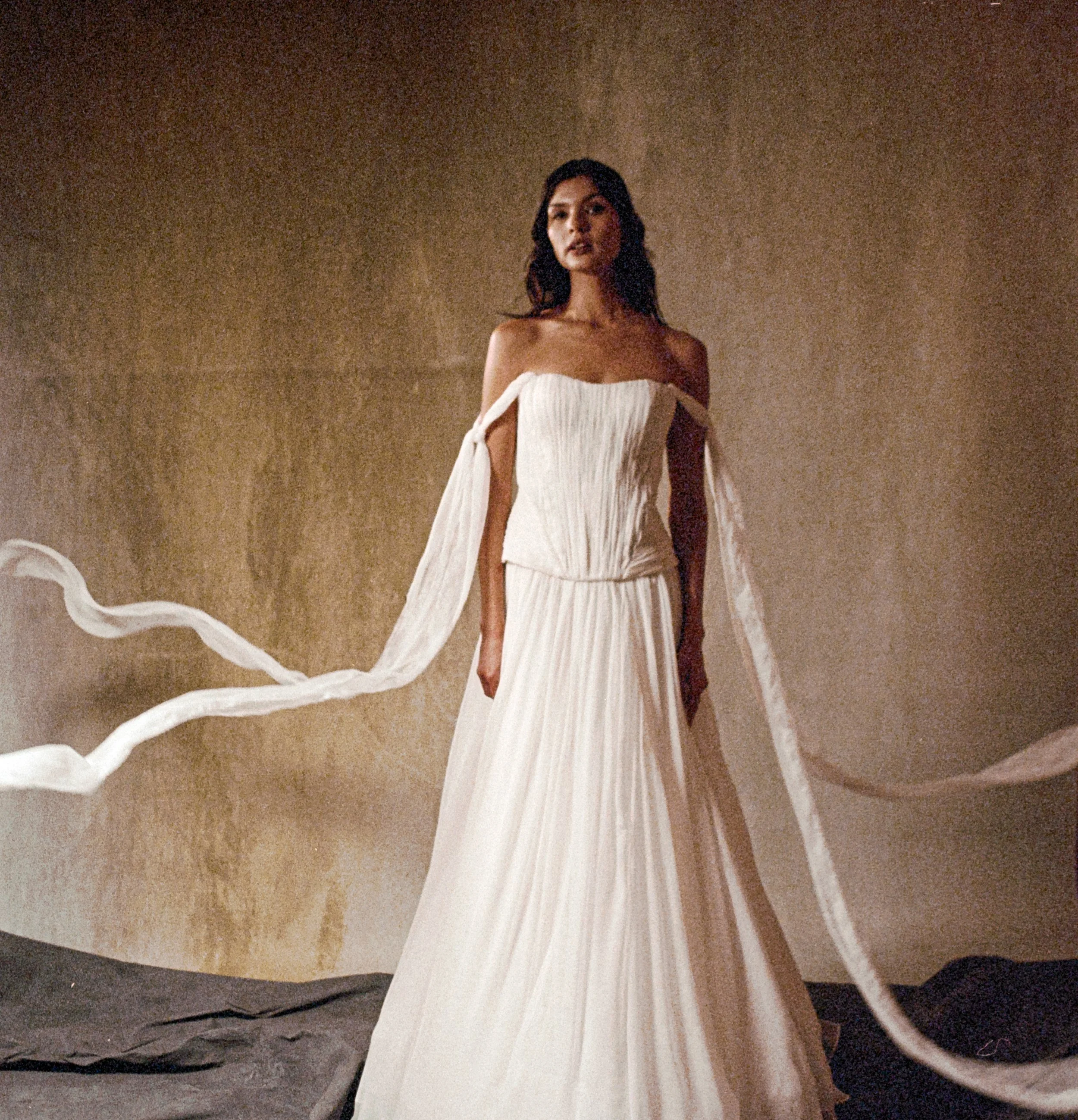 Hand-Draped crinkled silk chiffon gown with separating bustier look.