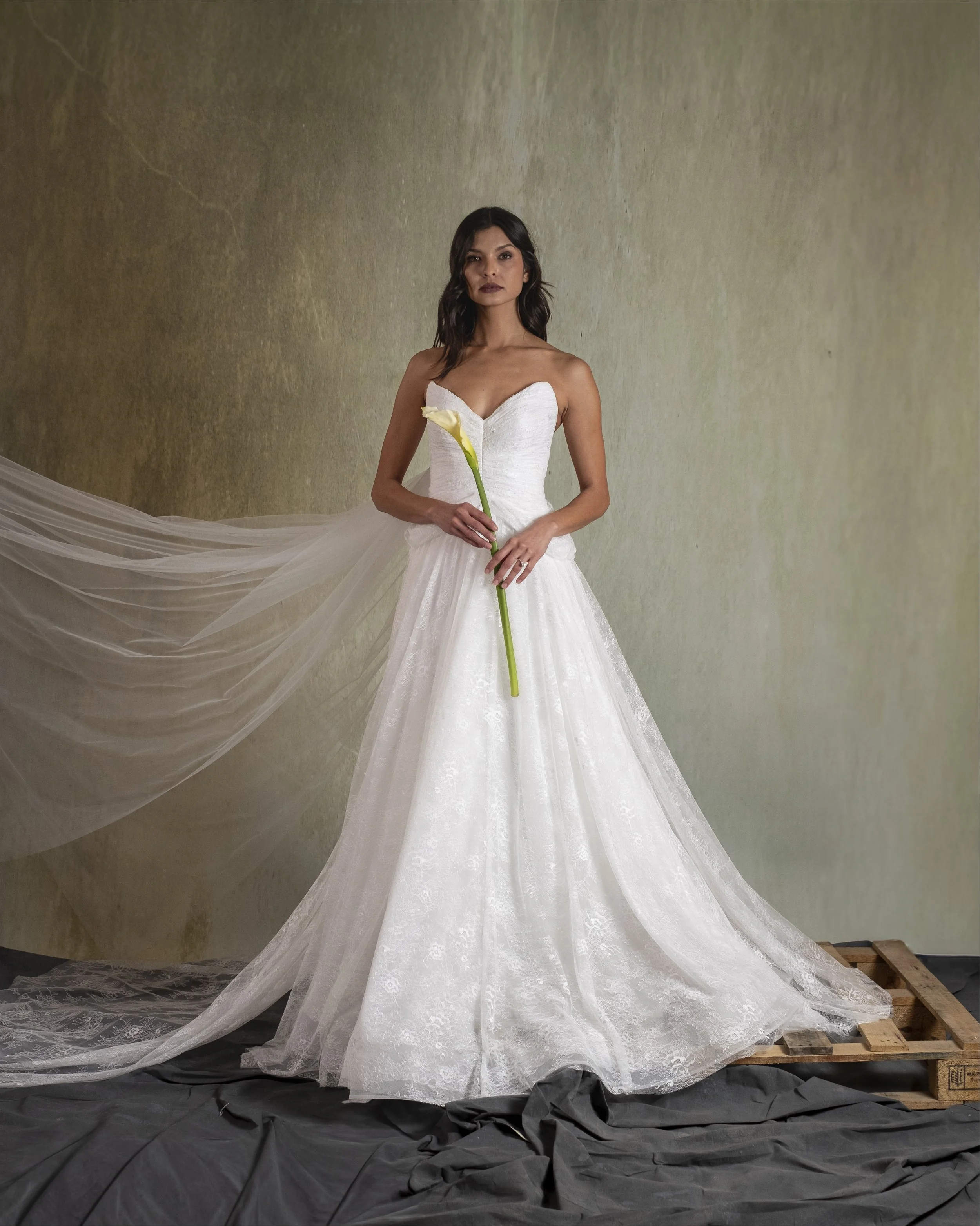 ELIZABETH GOWN - Hand-Draped chantilly lace gown featuring low hip points and soft hip drape.