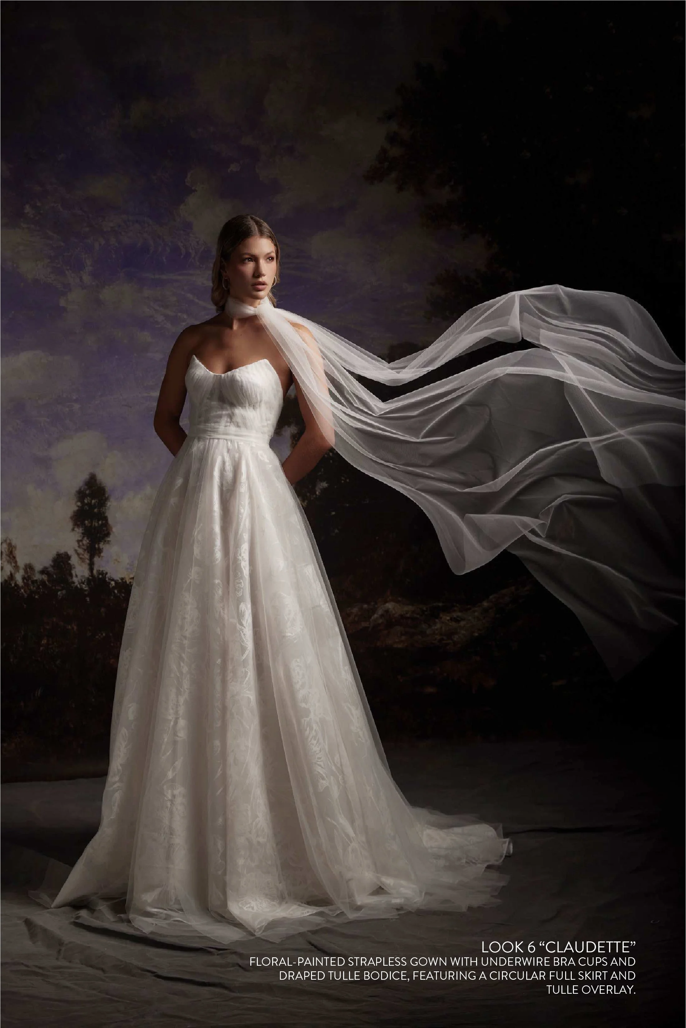 CLAUDETTE GOWN - Floral painted strapless gown with underwire bra cups and draped tulle bodice, featuring a circular full skirt and tulle overlay. 