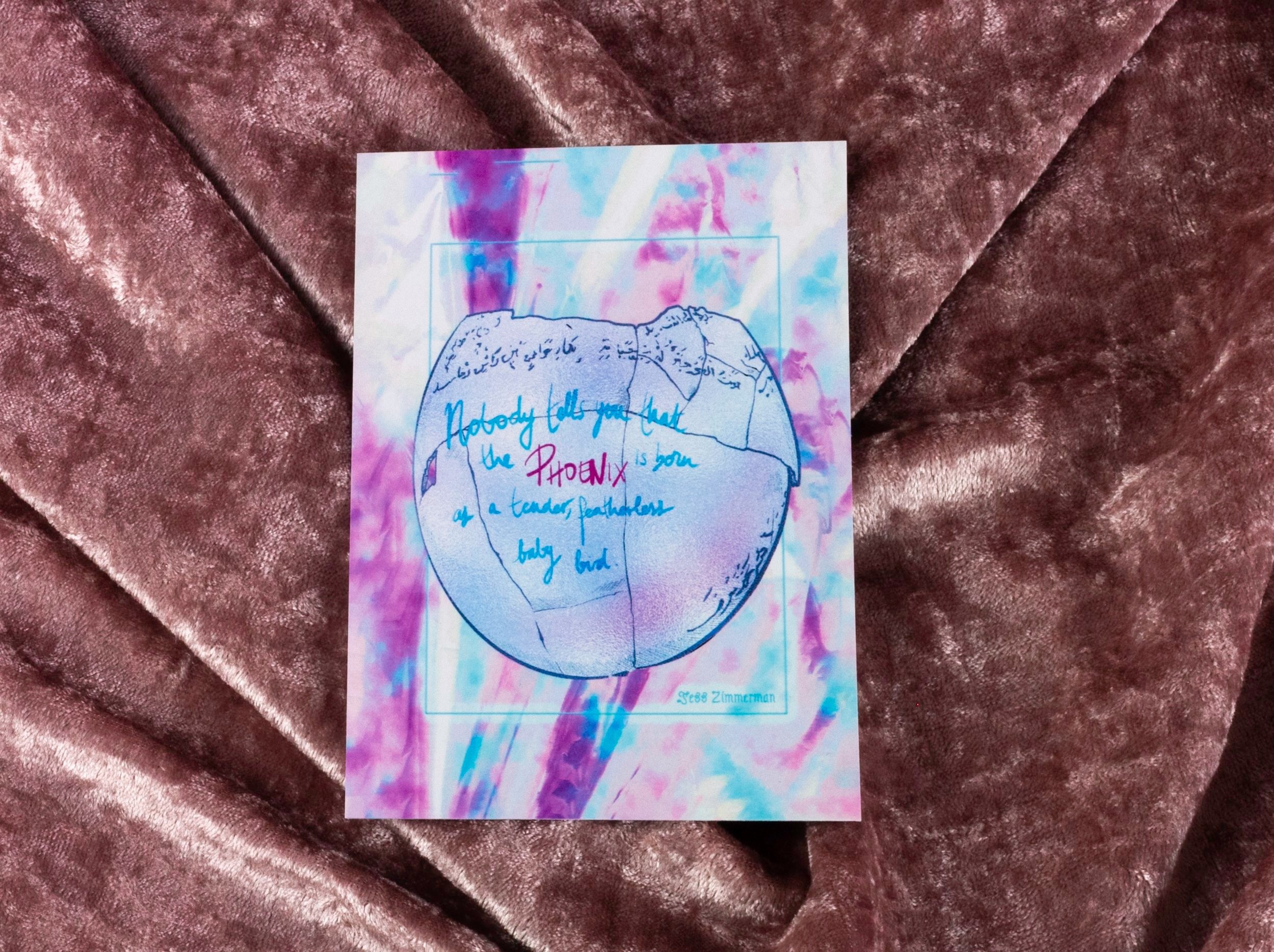 A postcard on top of blush velvet. A drawing of a cracked ostrich egg, inscribed with a quote by Jess Zimmerman. The drawing is in vivid blue, with a backdrop of purple, blue tie-dye