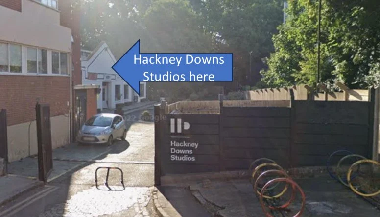 Village Green view of the approach to Hackney Downs Studios London E8
