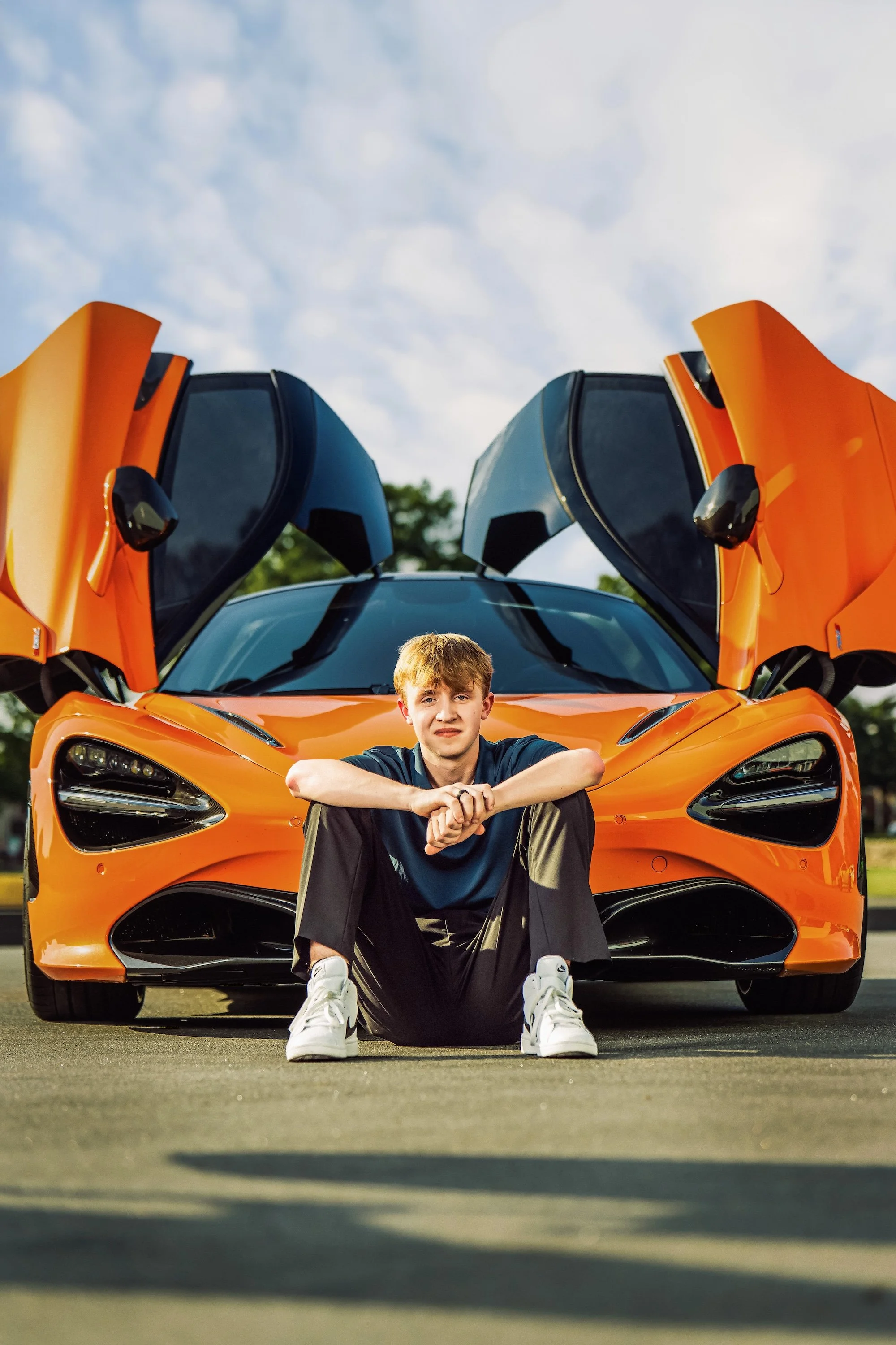 Kansas City senior portrait with McLaren supercar by Aimee Geis Photography