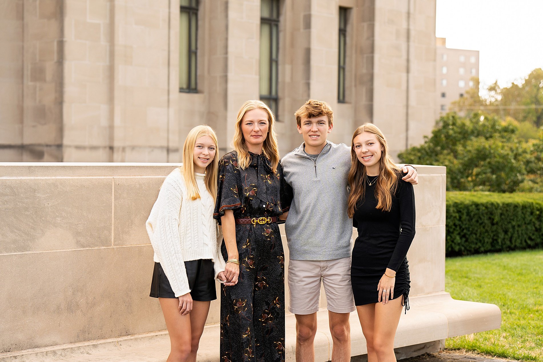  mom and three kids during family session in Kansas City 