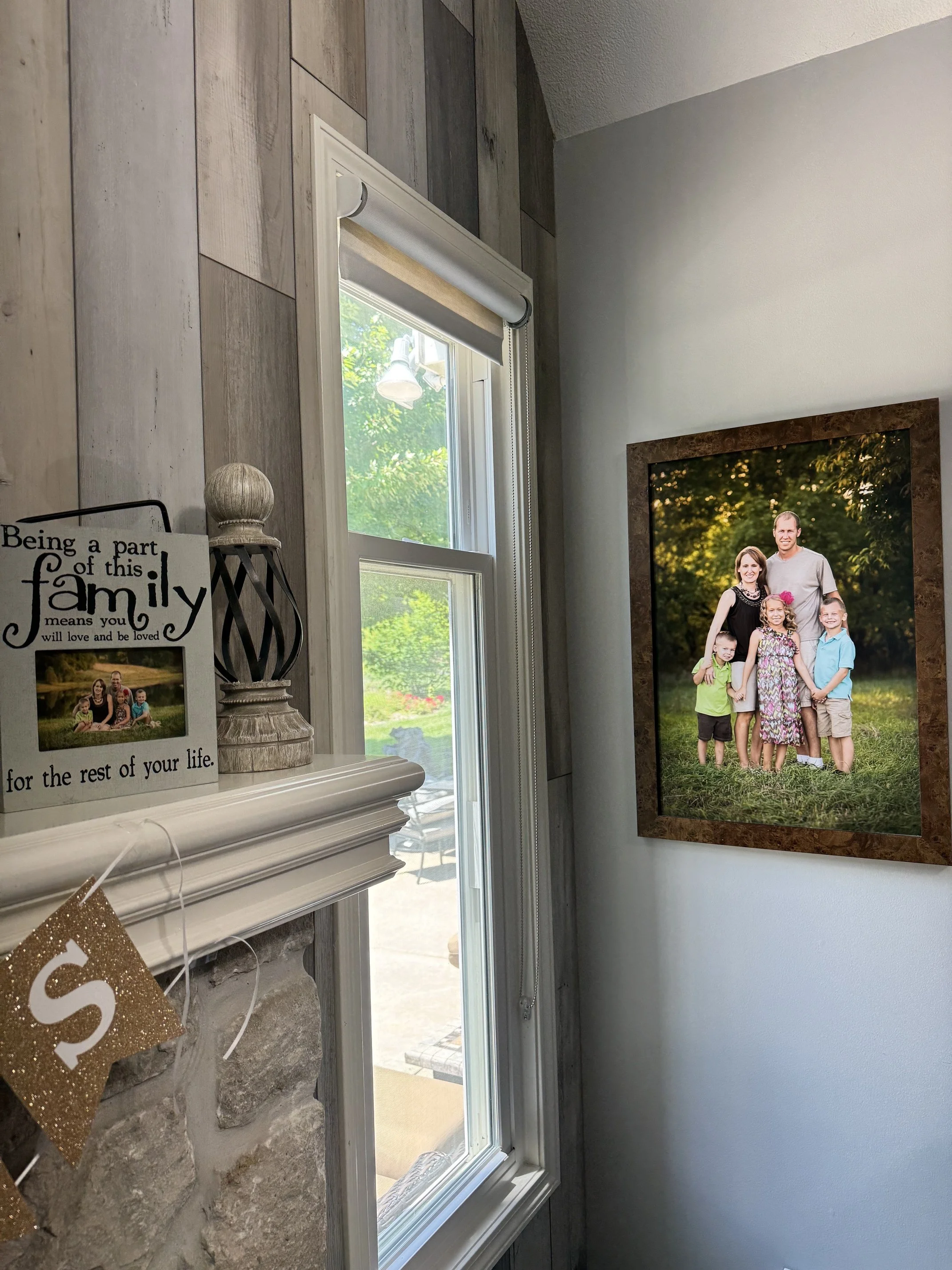  Large family portrait displayed as wall art in a Kansas City home by Aimee Geis Photography 