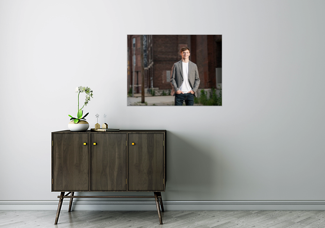 Kansas City senior portrait displayed as a large wall print in a modern home by Aimee Geis Photography