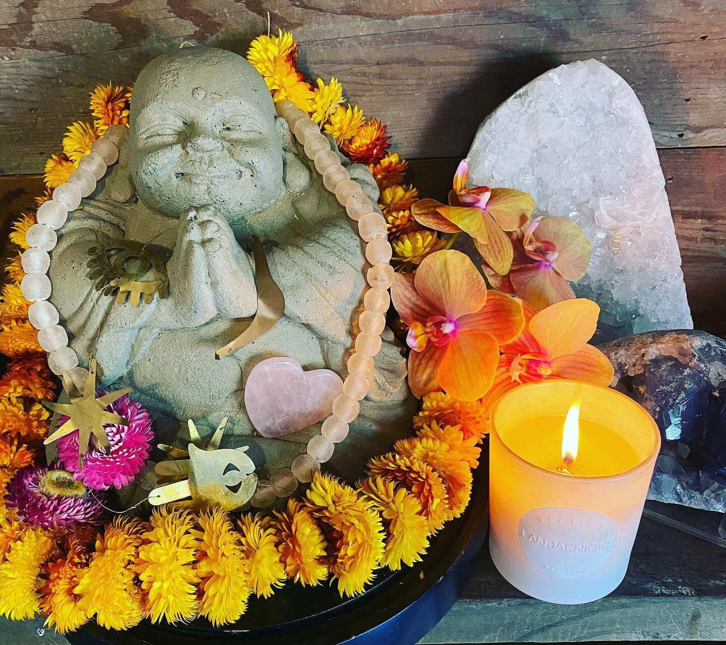 Our Curated Collection of Buddhas, Crystals &amp; Signature Crystal Bracelets hand made by Shannon @theenchantedabode, exquisite LanJaneckeCandles @lanjaenicke, hand strung straw flower garlands, Palo Santo sticks, sage bundles, blessing beads &amp; 