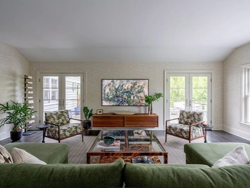 🚨Before &amp; After: 

The redesigned family room works so much better for our clients. We replaced the furniture and truly took advantage of the space. With textured wallpaper, a pop of color with the green sectional and accent chairs, and plenty o