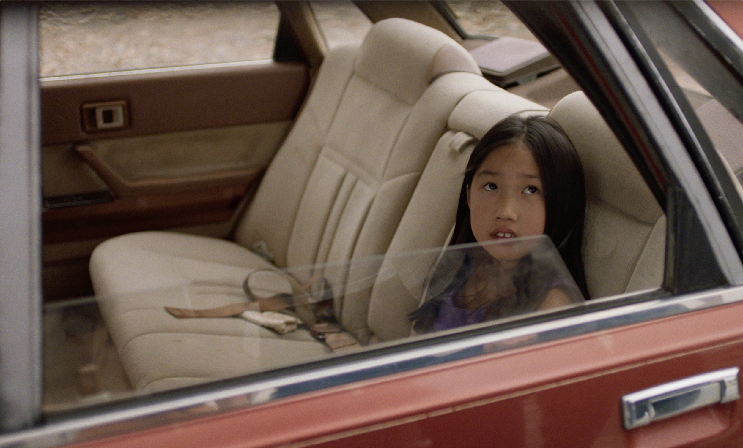Shelly in backseat.png