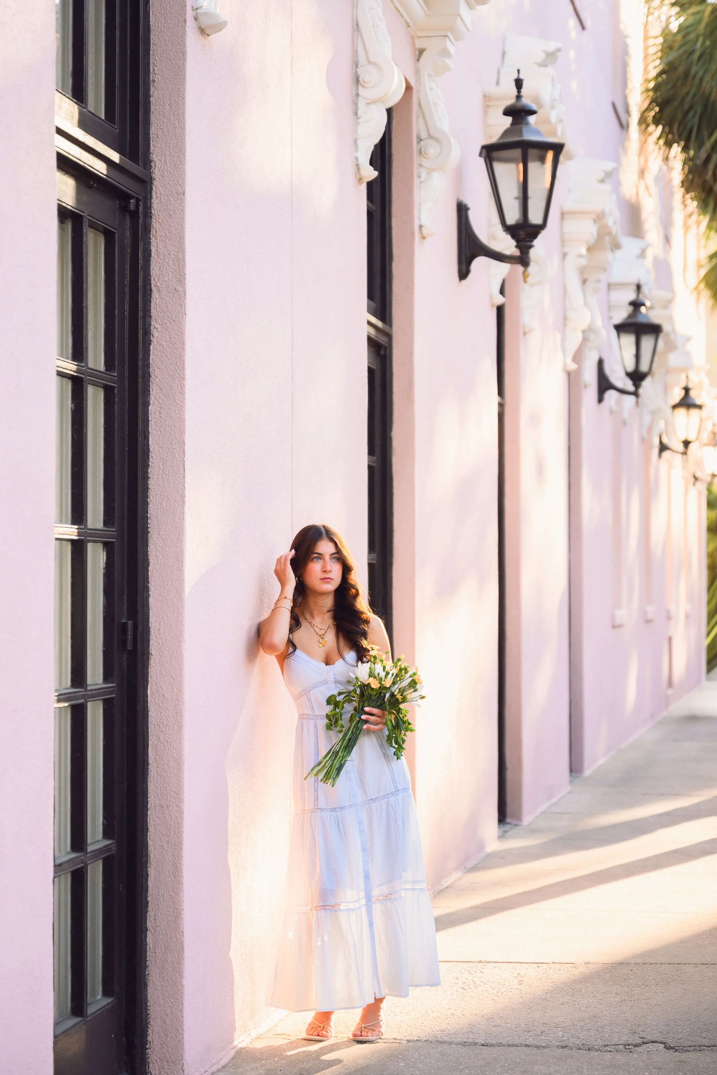Charleston senior portrait Mills House Hotel pink wall French Quarter