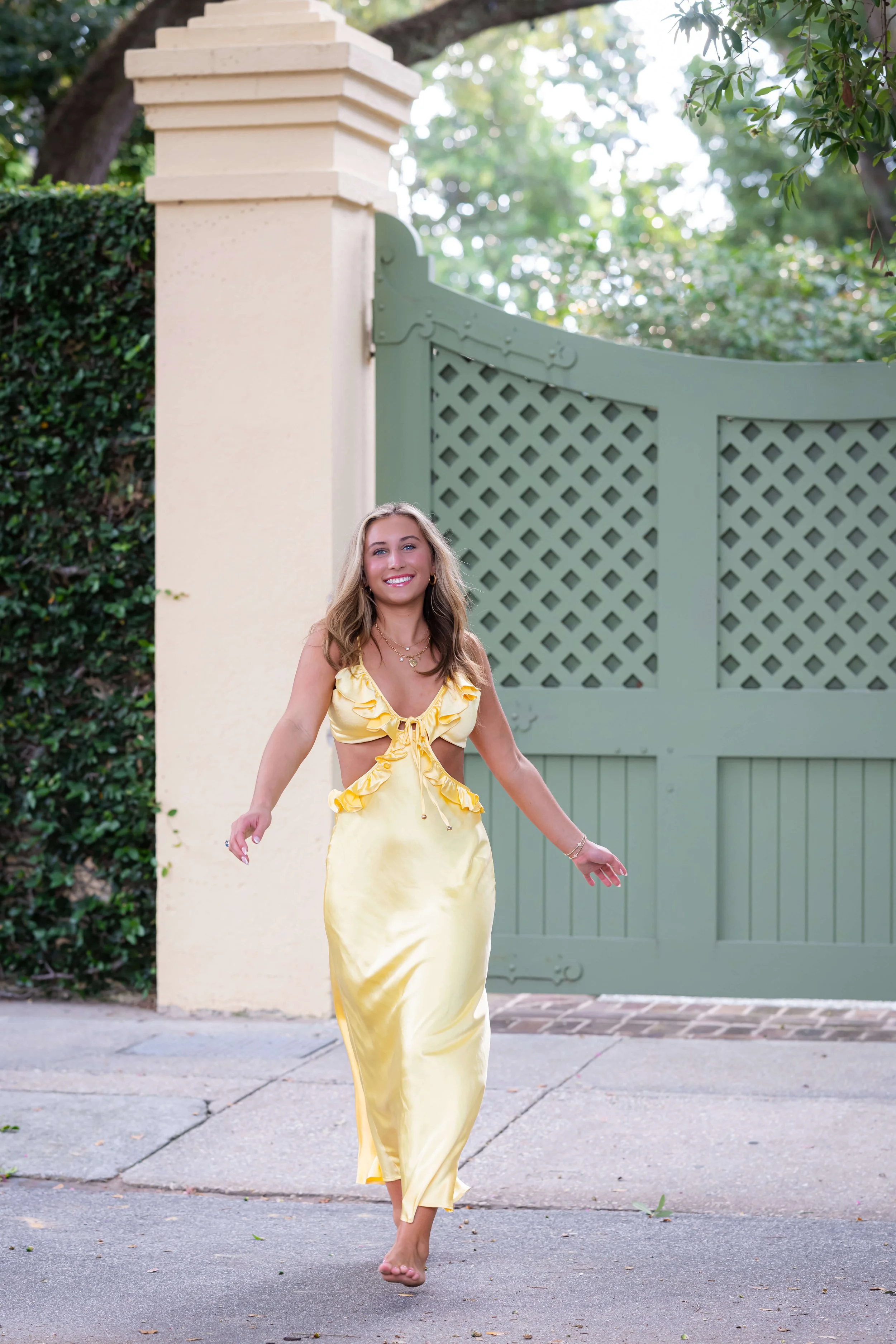charleston-senior-portrait-girl-yellow-dress-smiling.jpg
