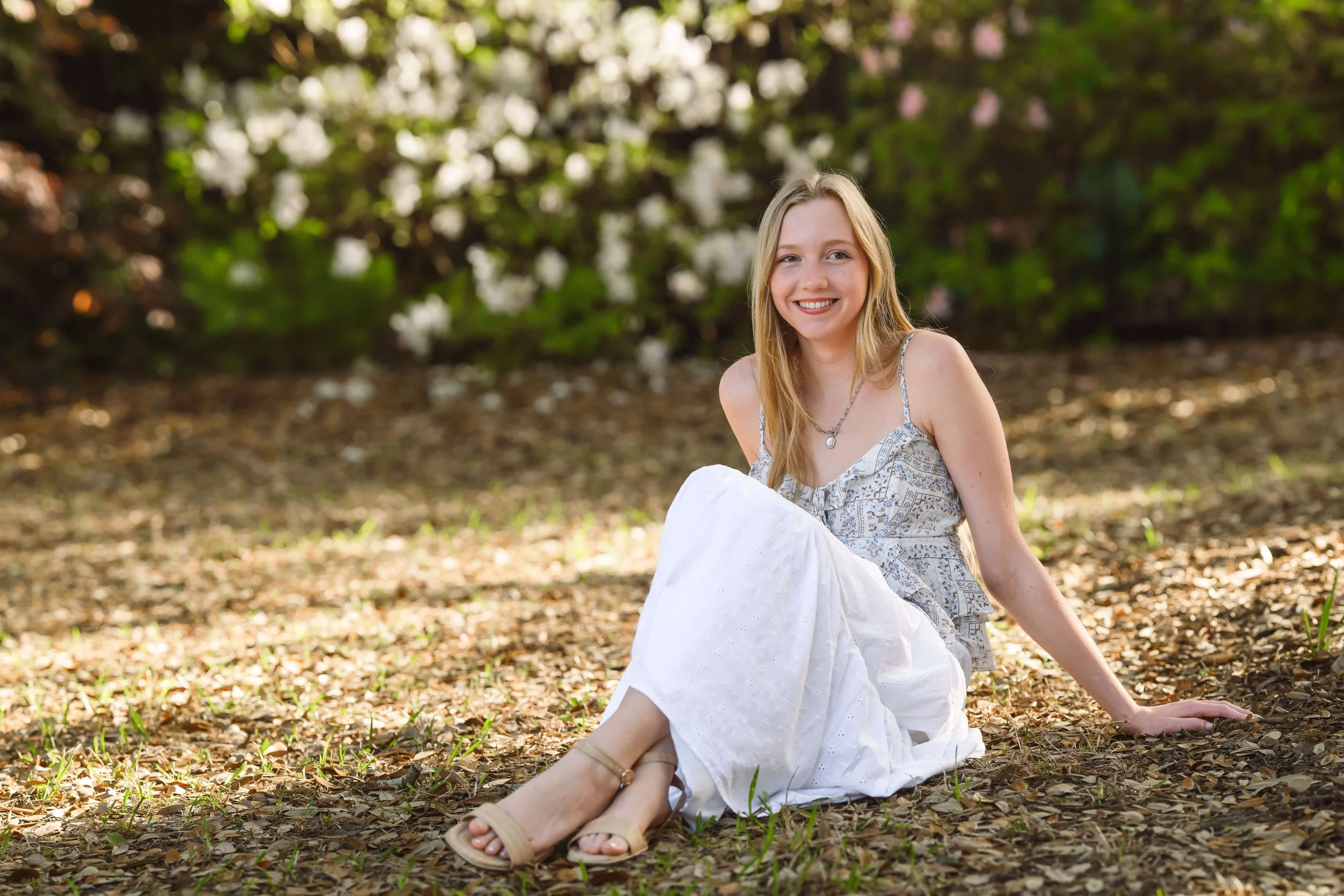 charleston-senior-photos-girl-sitting-park.jpg