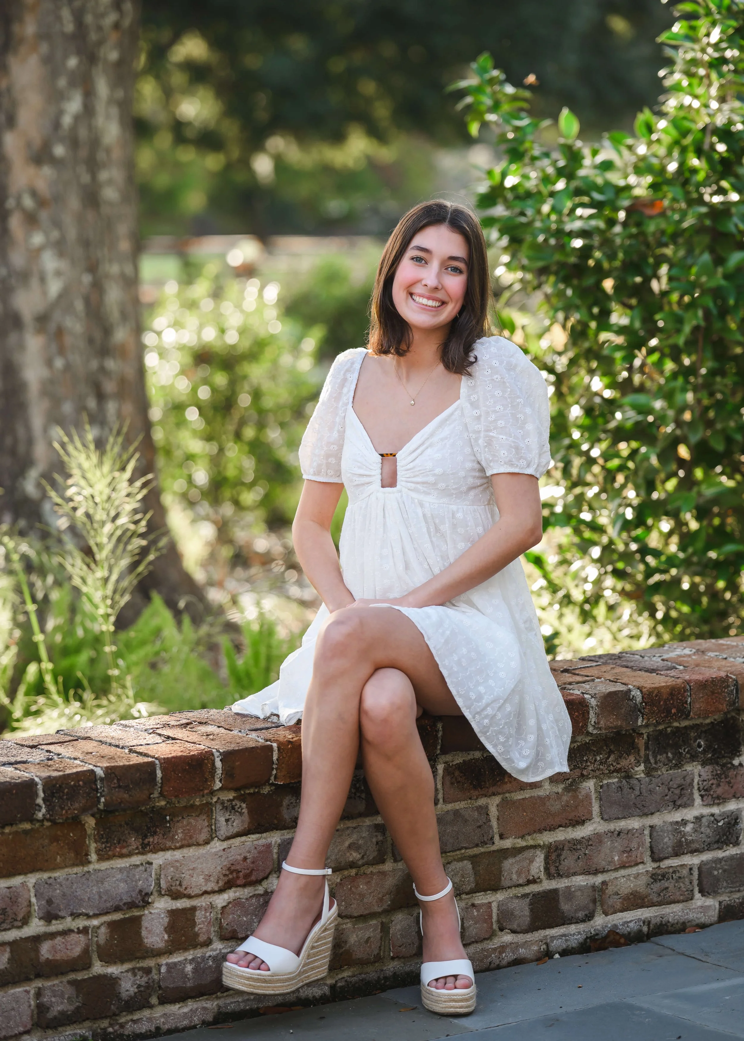 charleston-senior-photos-hampton-park-brick-seat.jpg
