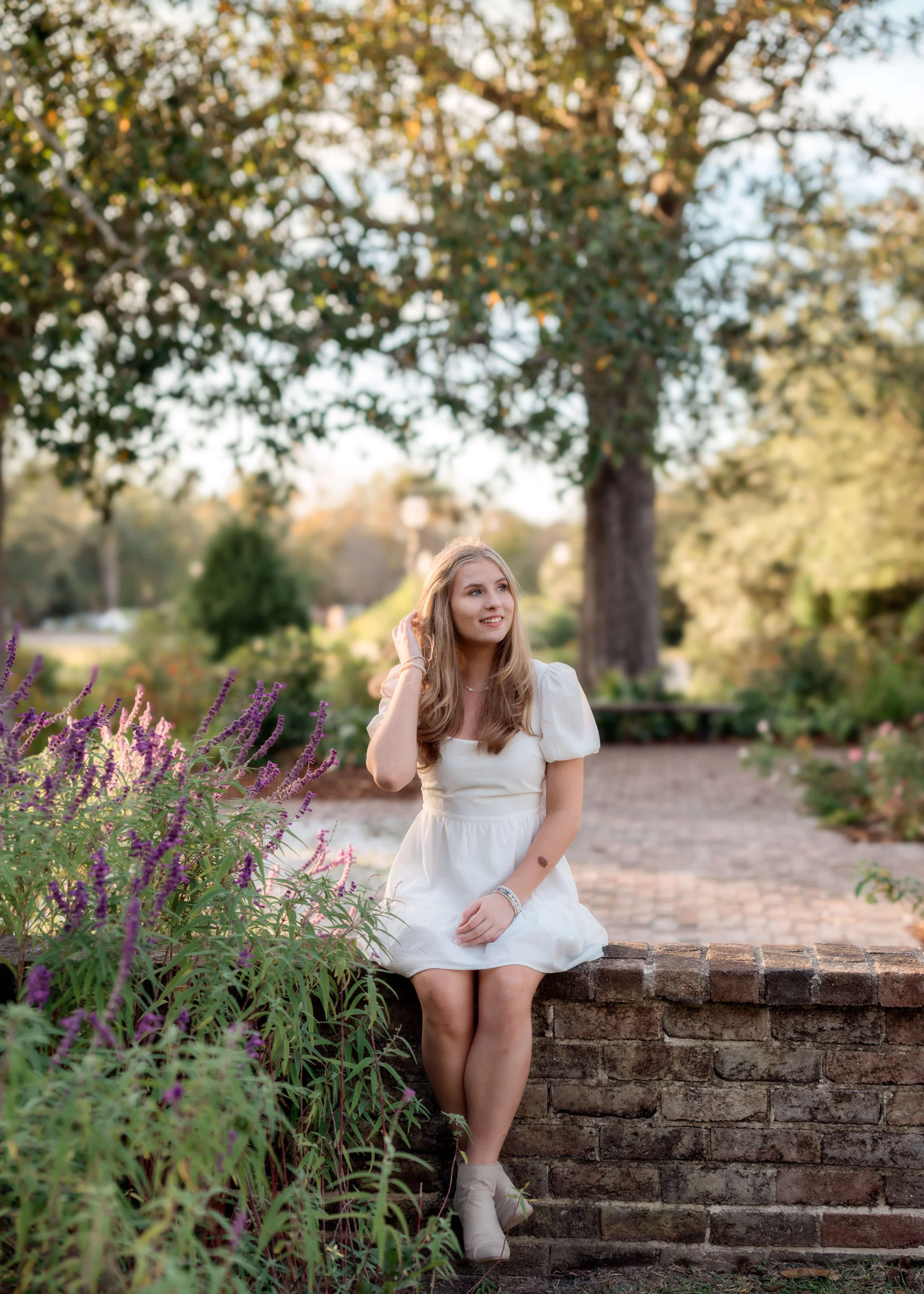 charleston-senior-photos-hampton-park-purple-flowers.jpg