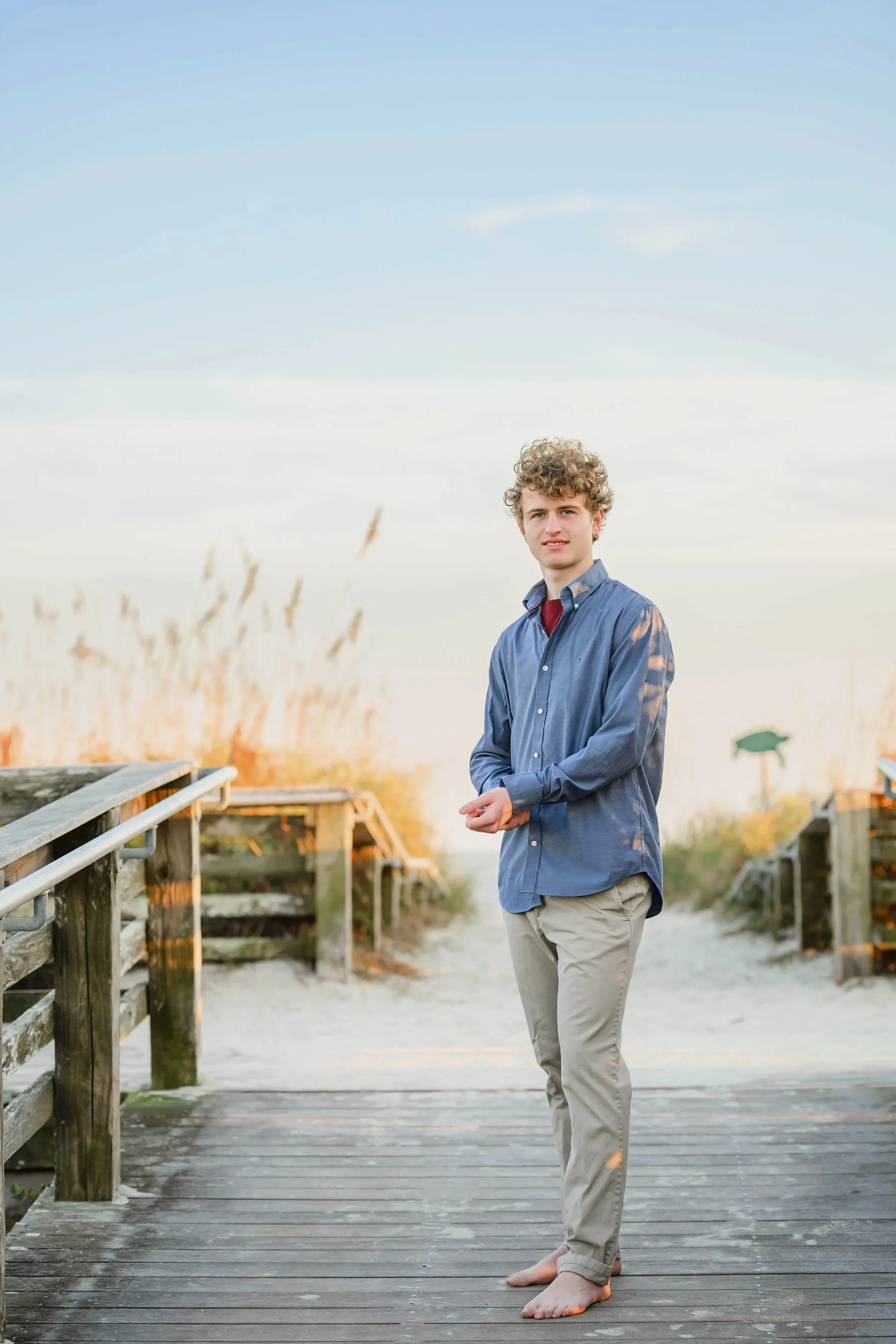 senior-session-isle-of-palms-boy-blue-shirt-sunset-3.jpg