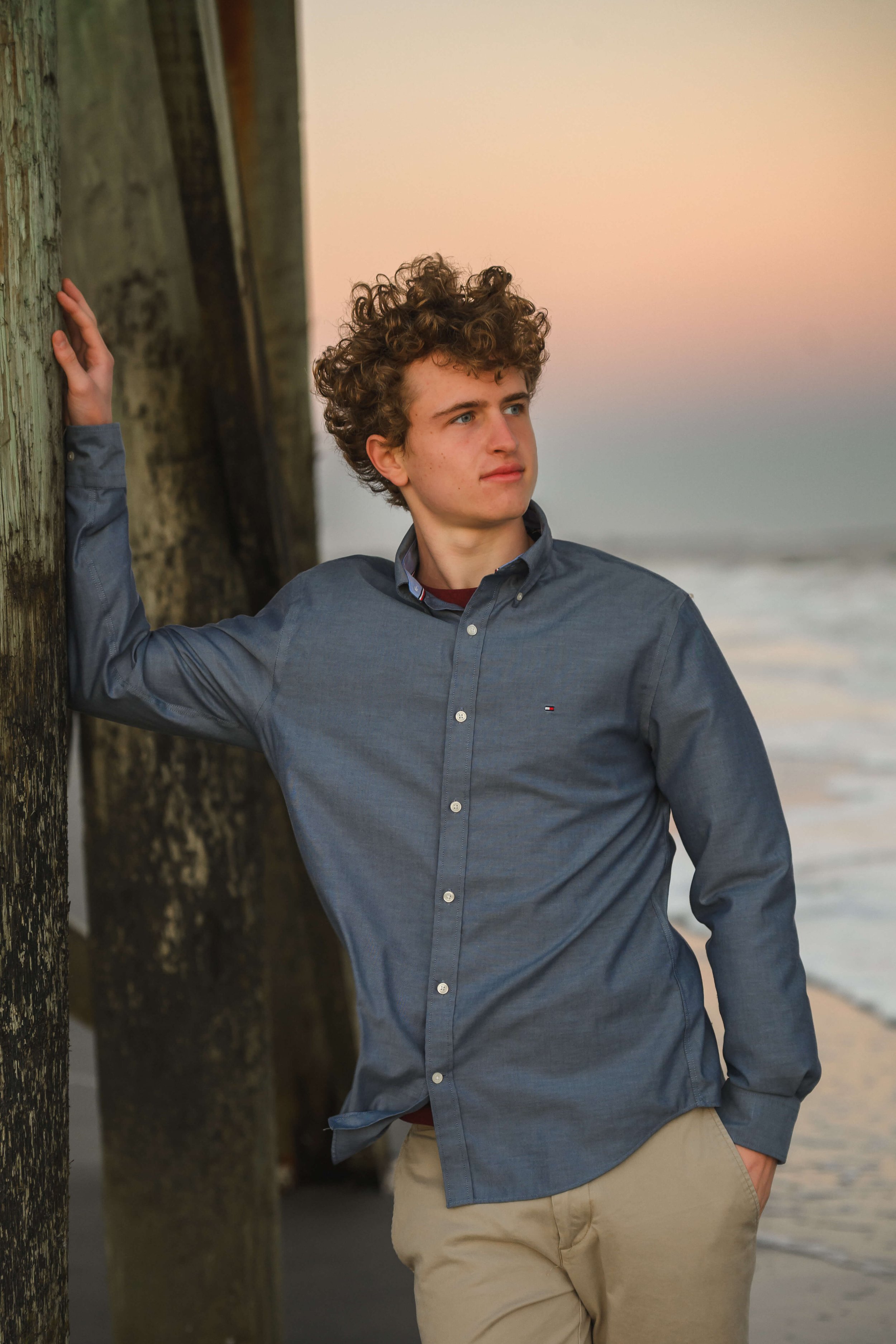 senior-session-isle-of-palms-boy-blue-shirt-sunset-5.jpg