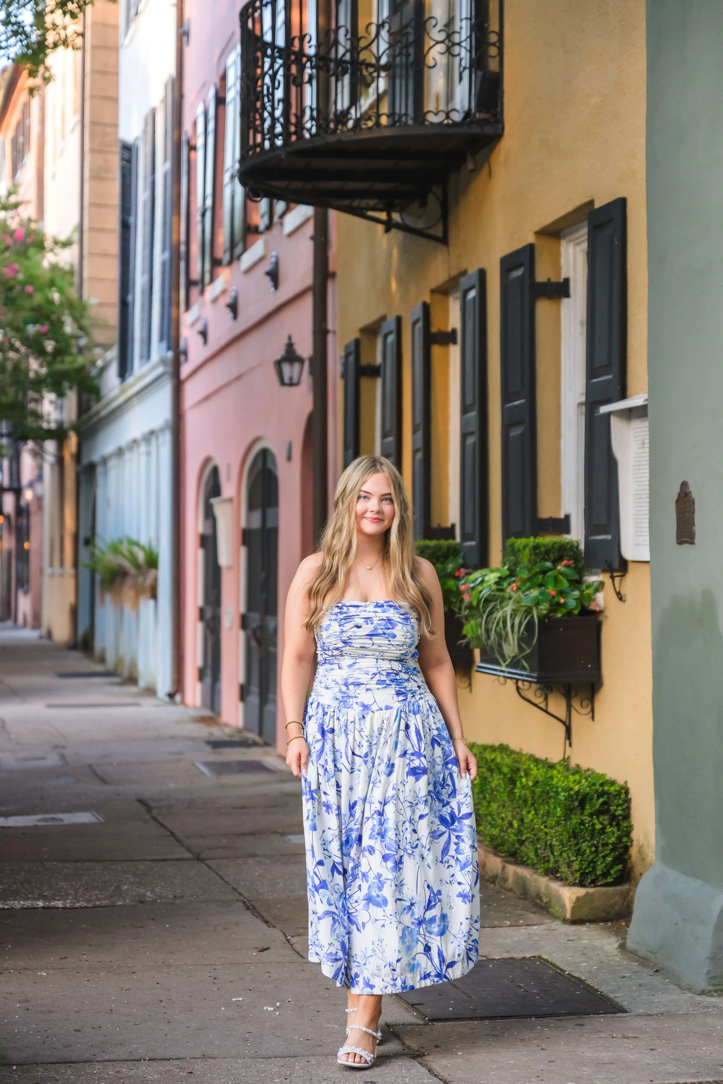 Charleston senior portrait at Rainbow Row East Bay Street