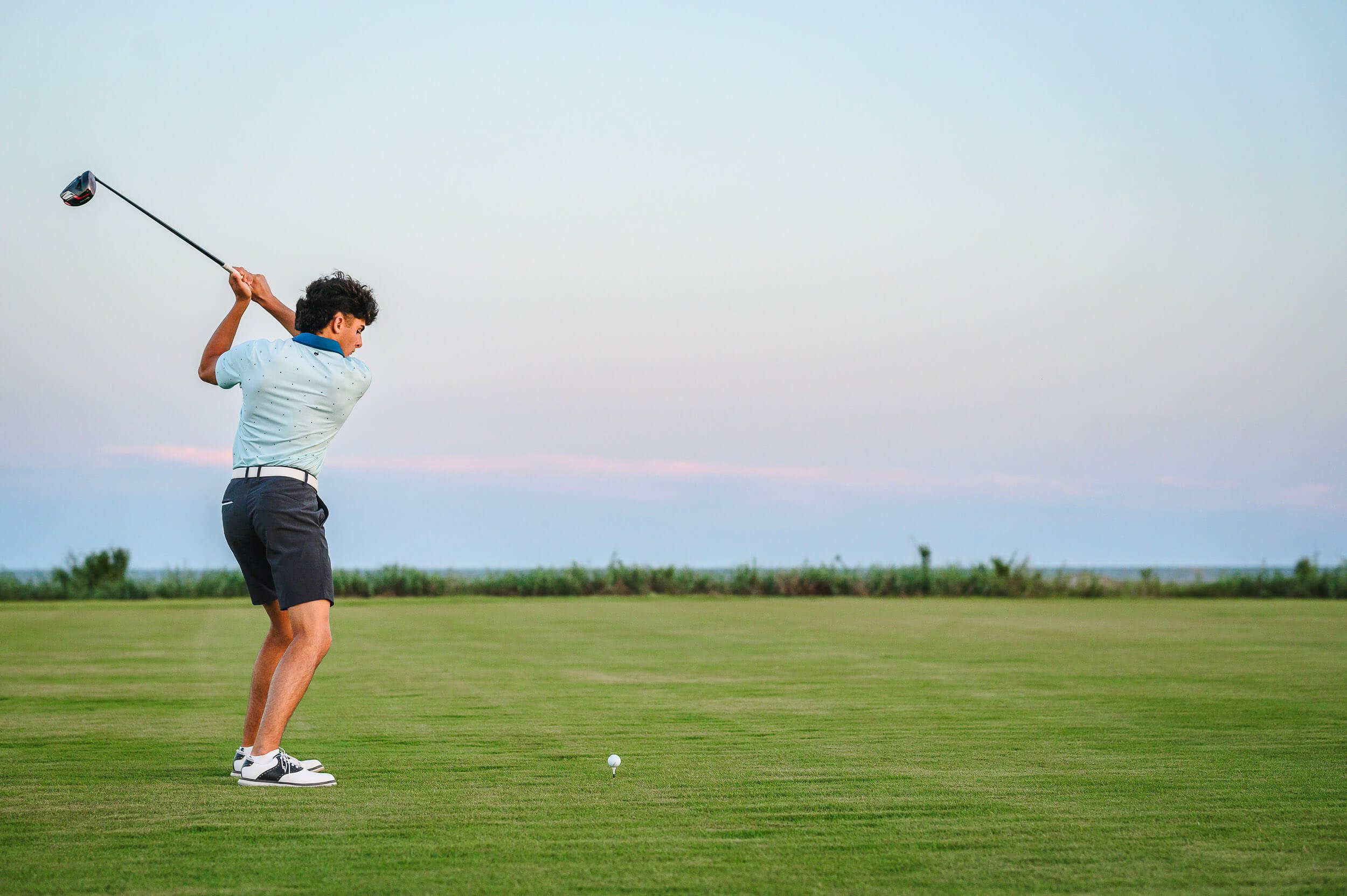boy-on-golf-course-sunset-11.jpg