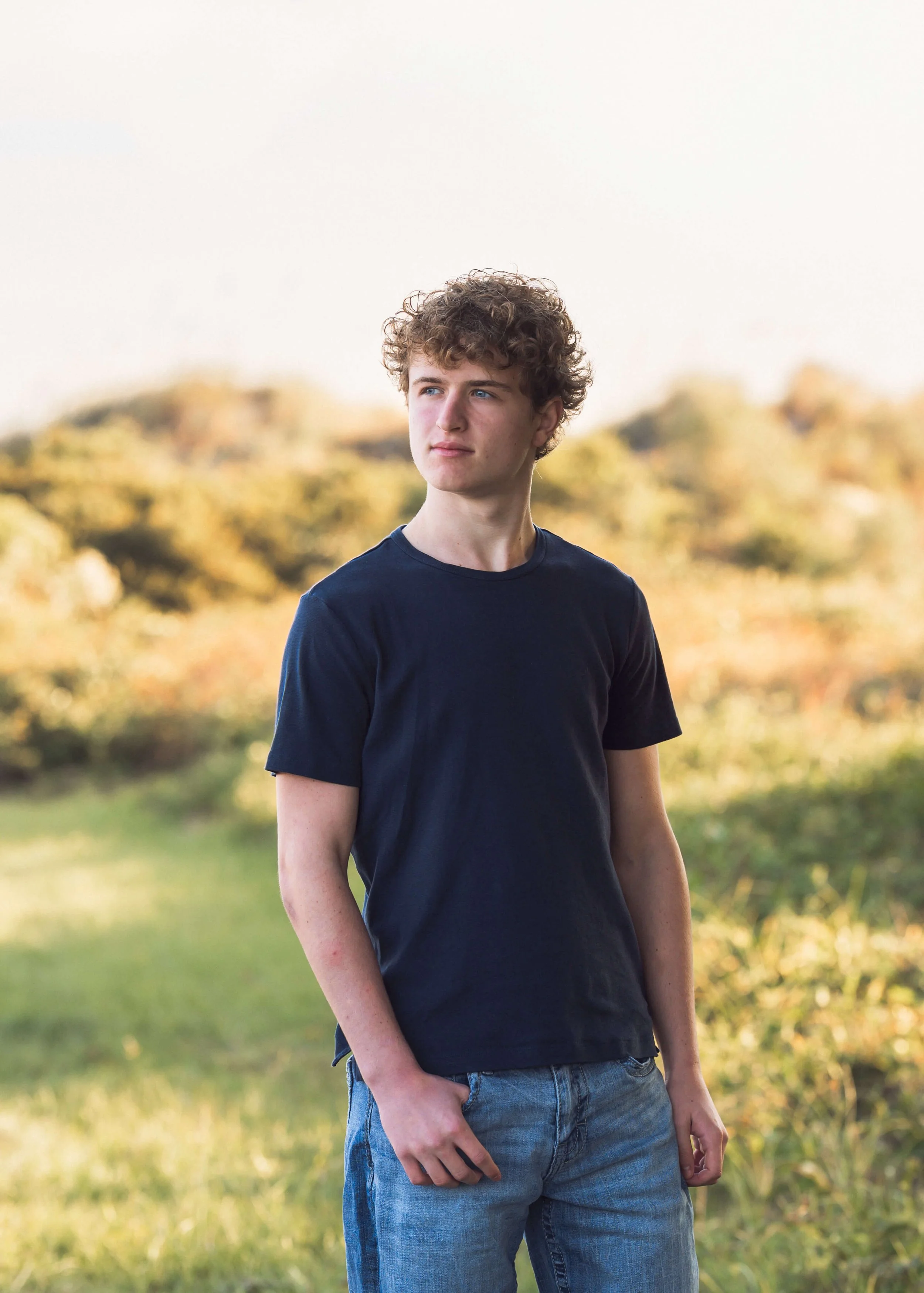 senior-portraits-boy-isle-of-palms-looking-off.jpg