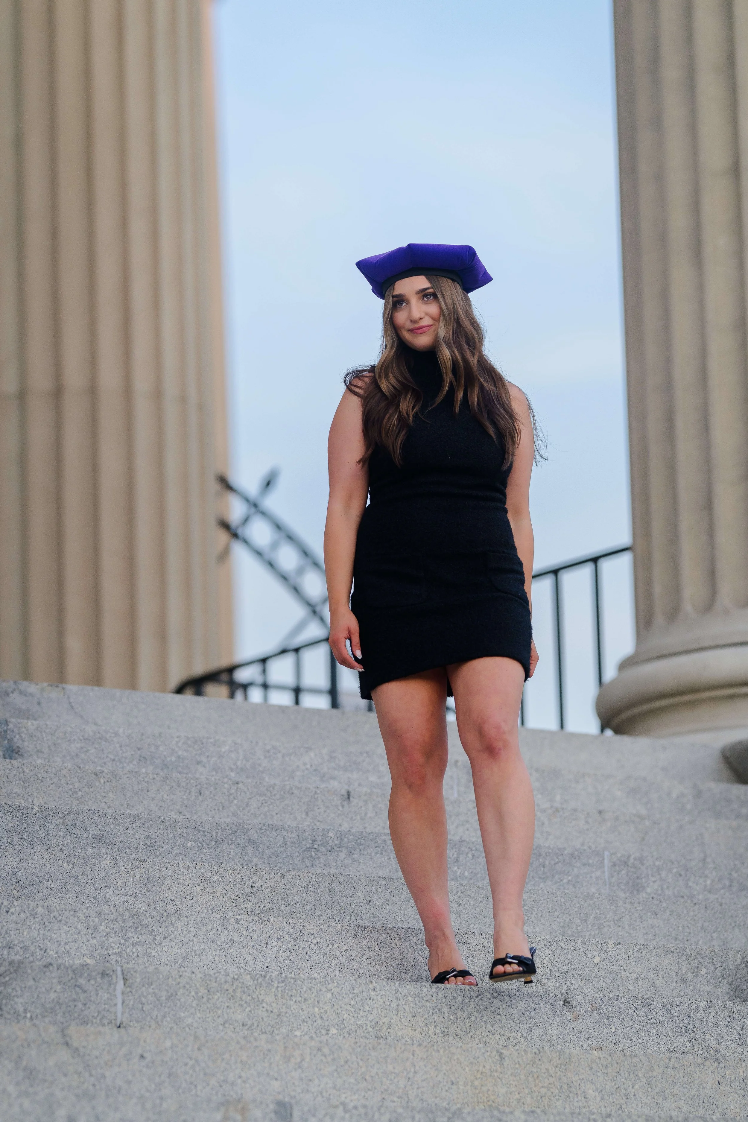 Charleston School of Law Grad Student walking down stairs at US Customs House