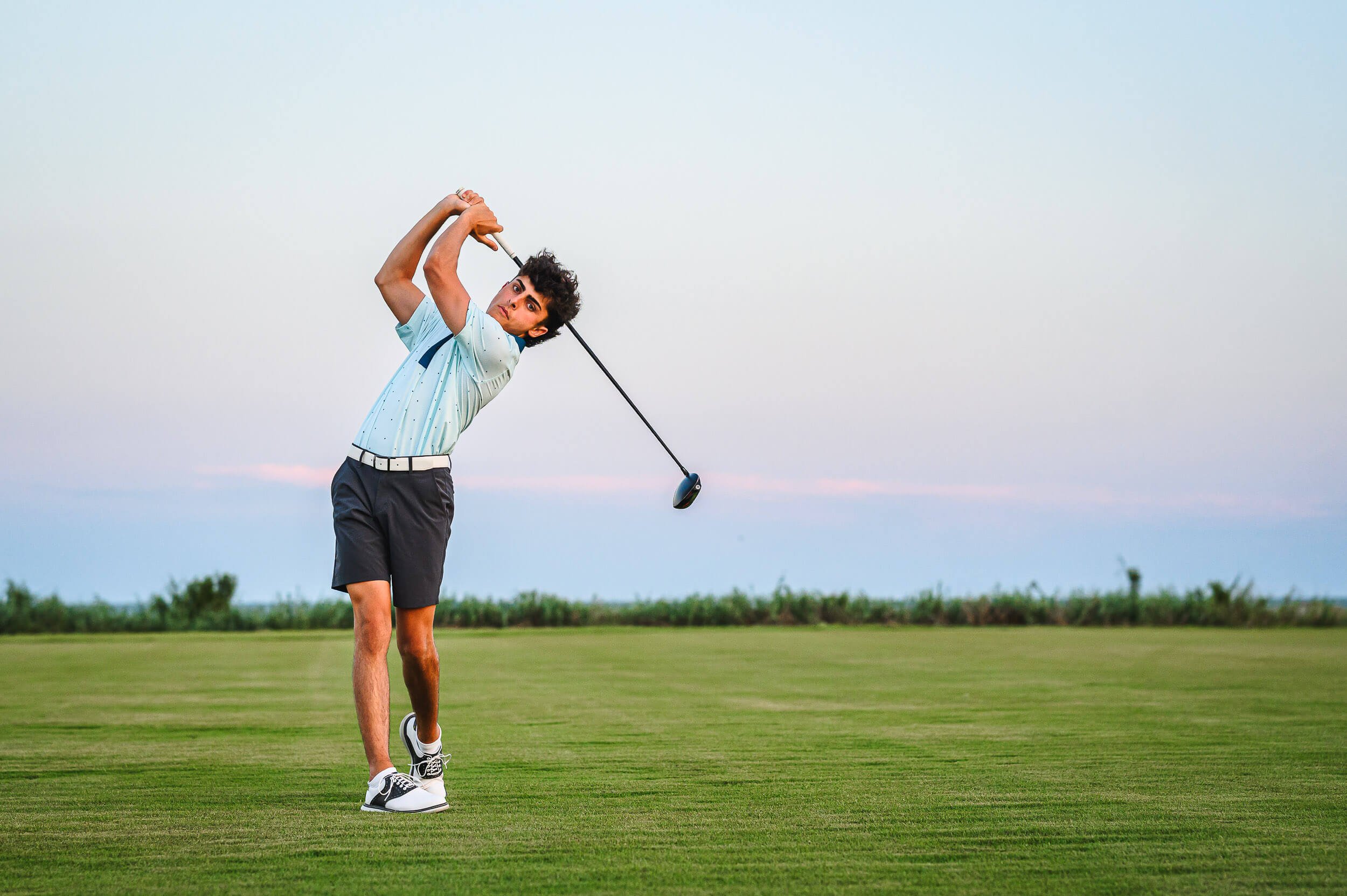 boy-on-golf-course-sunset-12.jpg
