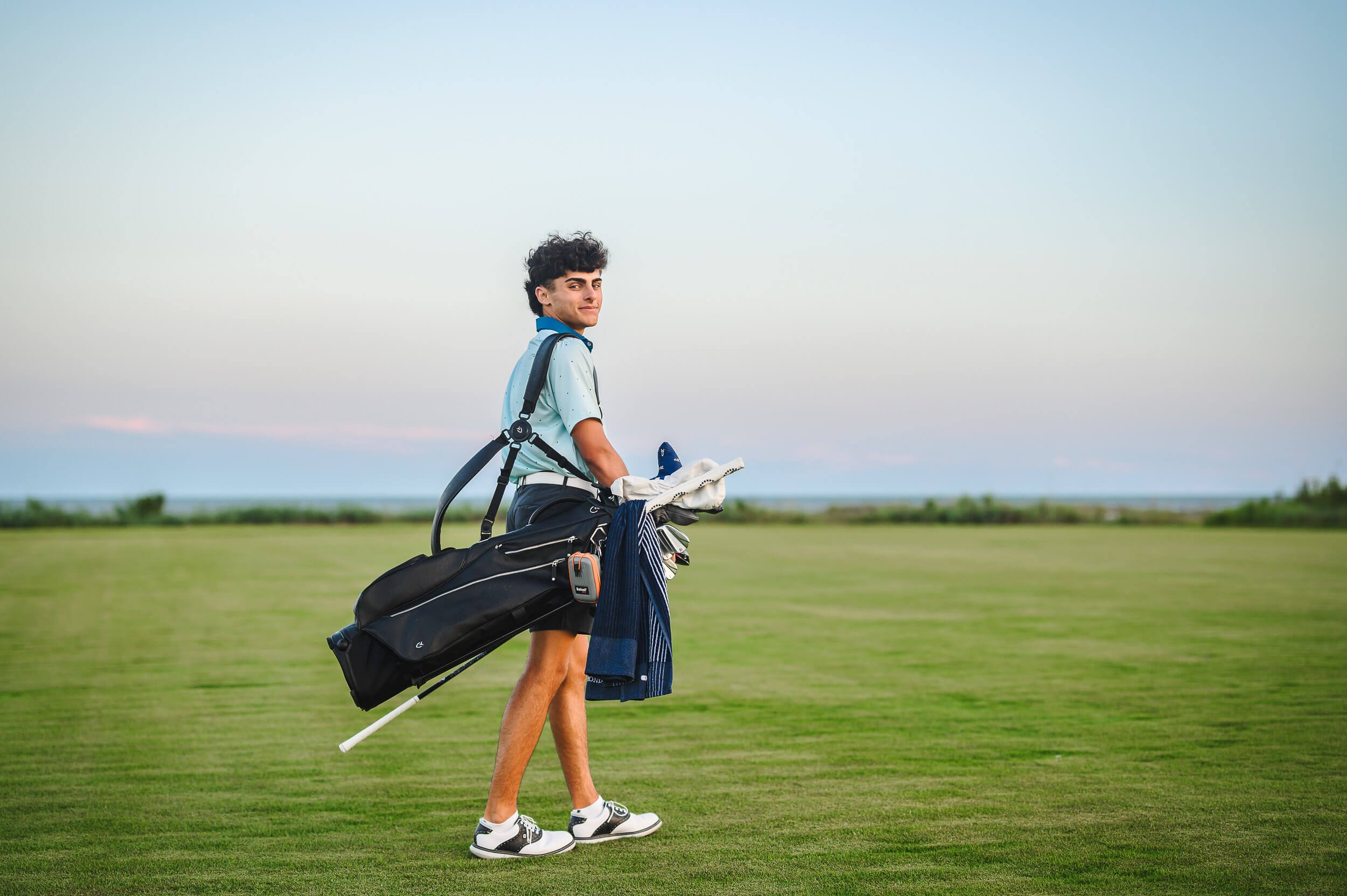 boy-on-golf-course-sunset-10.jpg