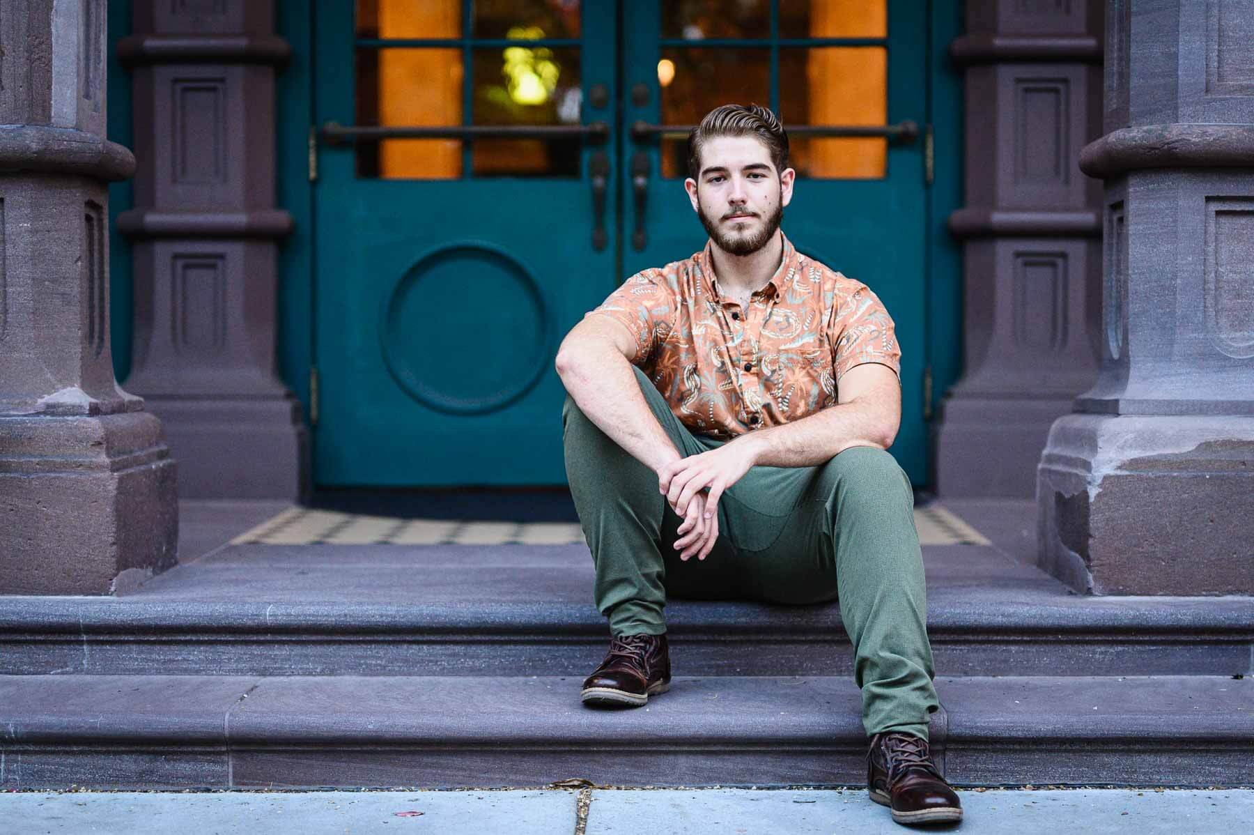 young-man-sitting-dock-st-theater.jpg