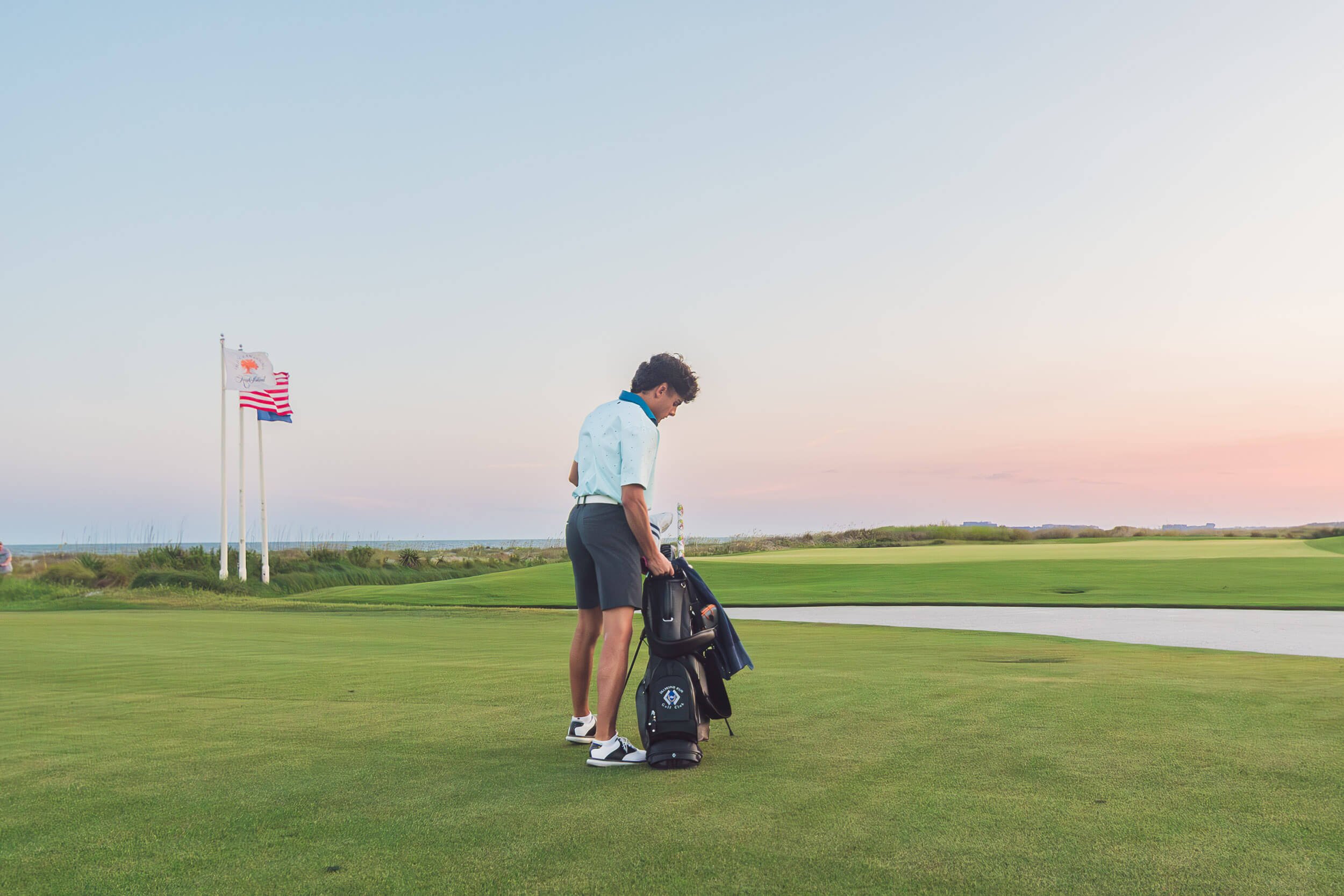boy-on-golf-course-sunset-2.jpg