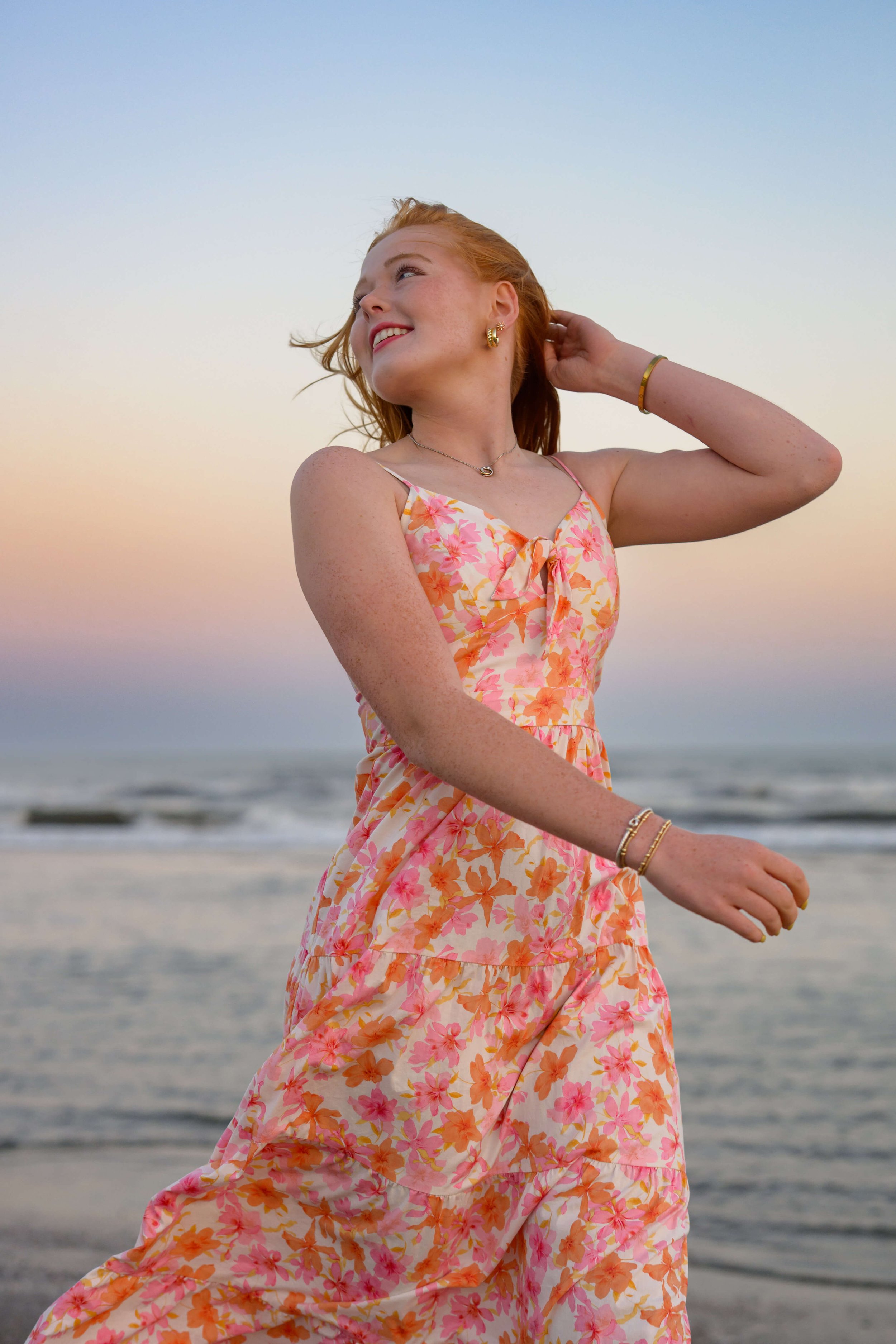 senior-session-Isle-of-Palms-running-on-beach (1).jpg