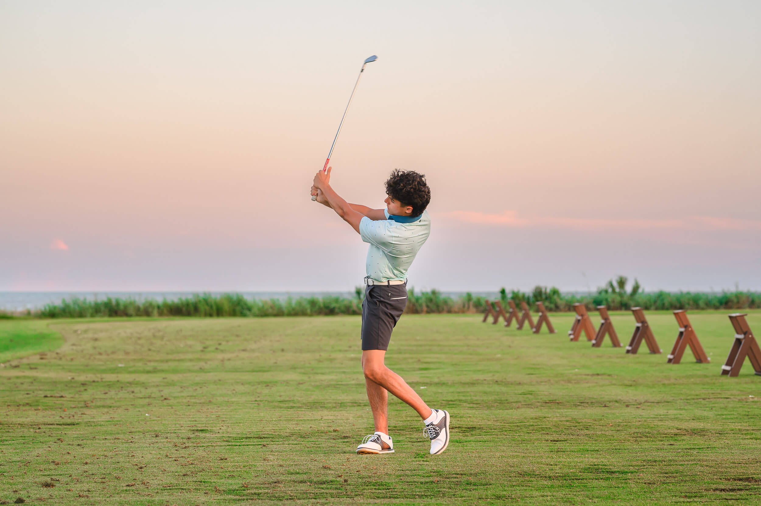 boy-on-golf-course-sunset-3.jpg