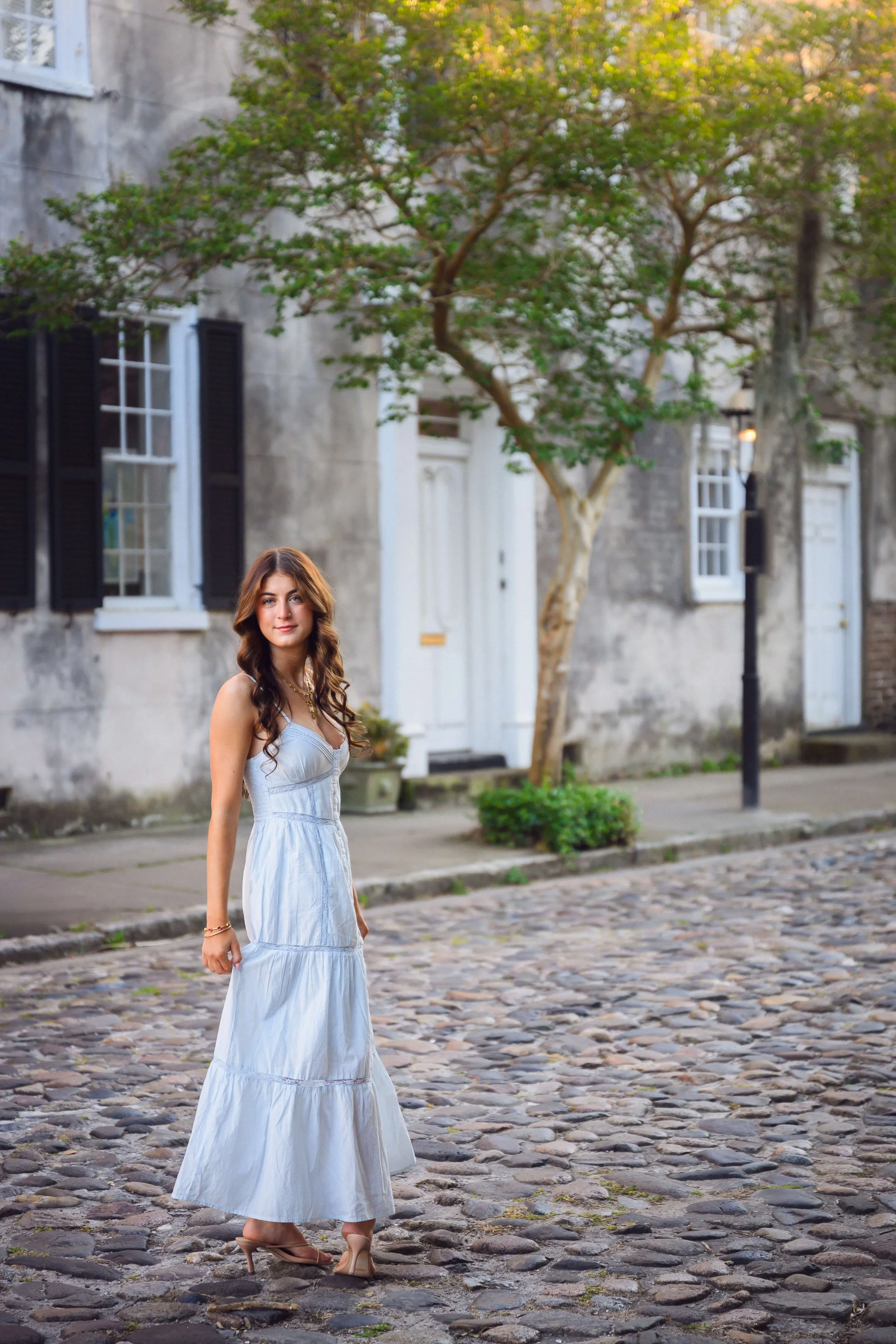 Charleston senior portrait Chalmers Street historic cobblestones French Quarter