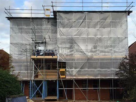 temp roof scaffolding.jfif.jpeg