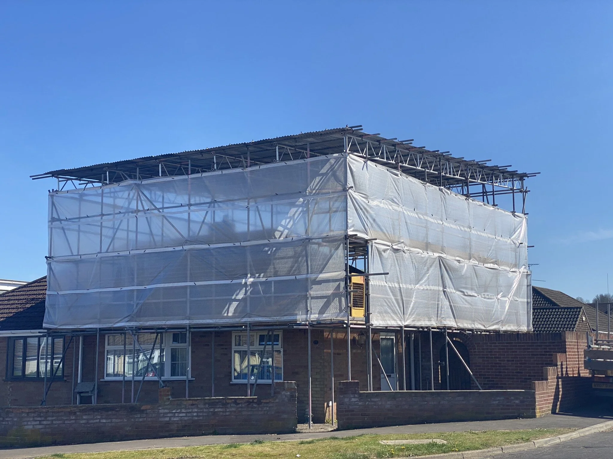 temporary roof.jfif.jpeg