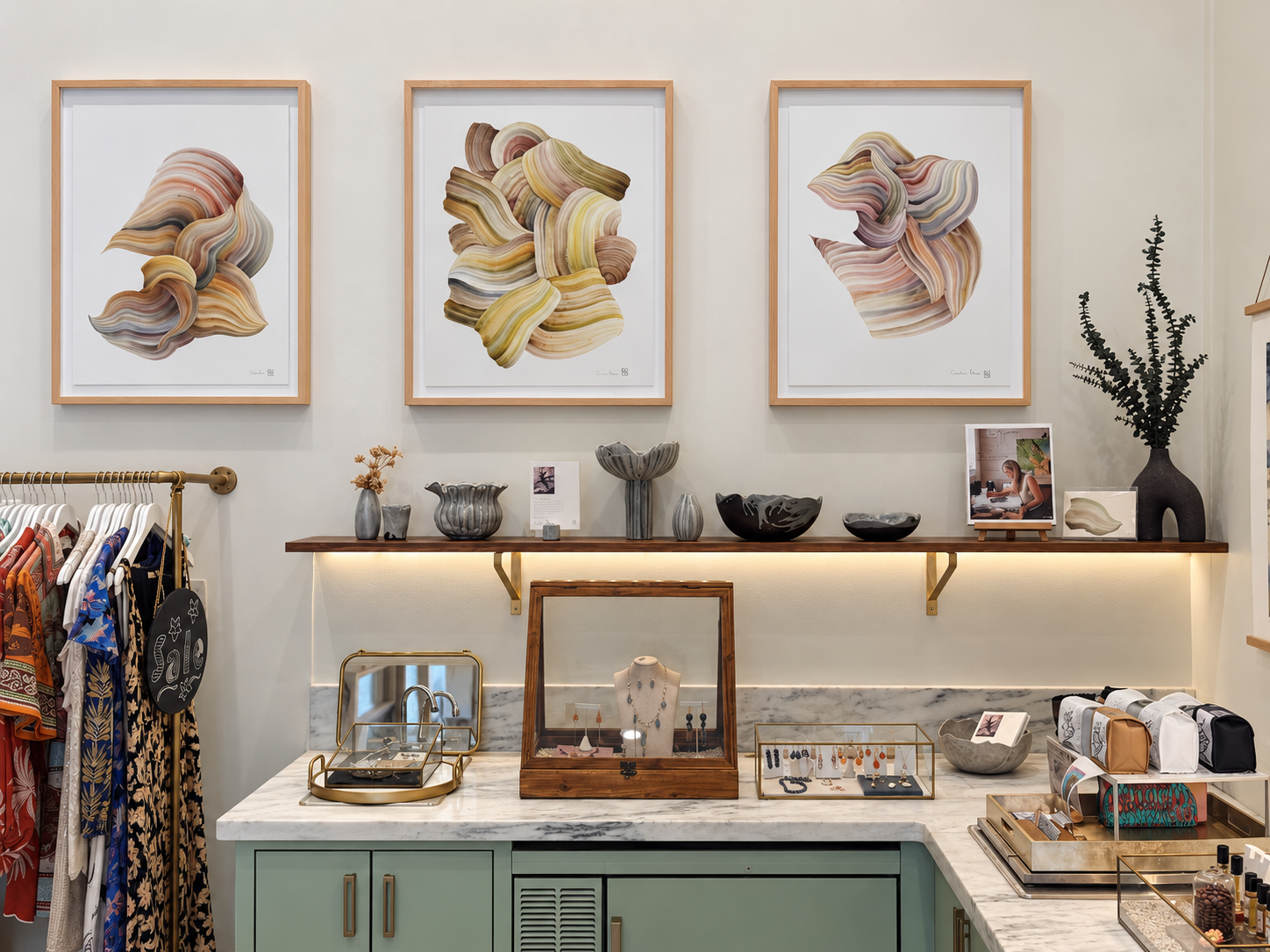 Cristina Hobbs watercolors and sculptural ceramics displayed together at Maison Djouf in Healdsburg, California.