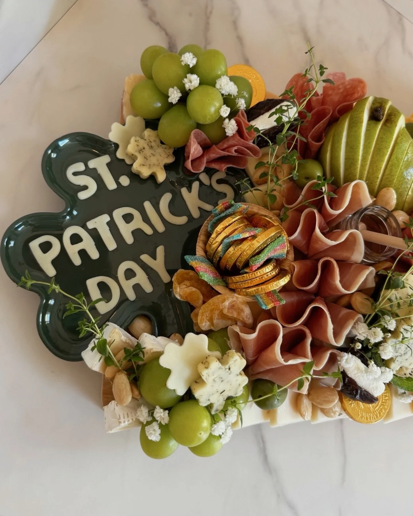 a clover the top charcuterie board 🍀🧀✨ 

#happystpattysday #30a #30acharcuterie #30afoodandwine