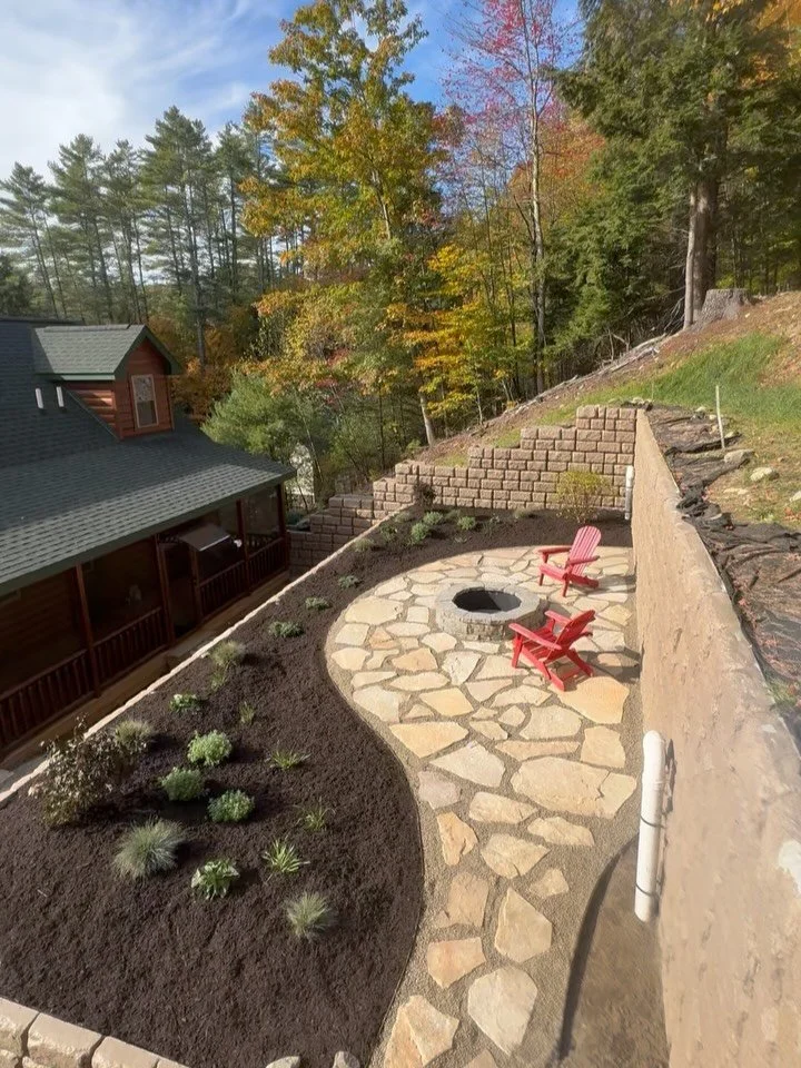 Just finished this natural stone patio and walkway for our client in Bolton Landing. The steep hillside and steps made this one a challenge to get material where it needed to be, but it was worth the effort. #retainingwallgarden #retainingwalls #natu