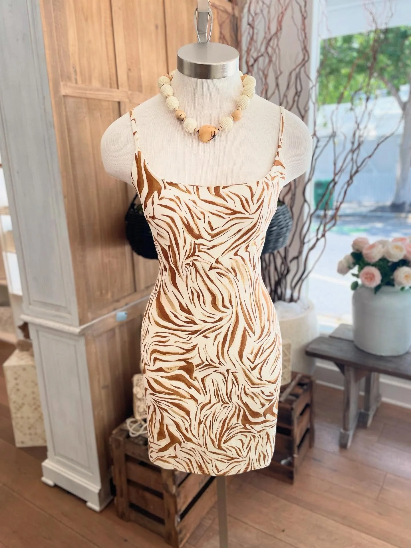 Wild, chic, and ready for summer nights 🌿✨
This body-hugging mini in earthy zebra print is giving major statement vibes. Perfect on its own, or layer with a denim jacket for that cool-girl edge&mdash;snag it while it&rsquo;s here 🐆🤎

#SummerStyle 