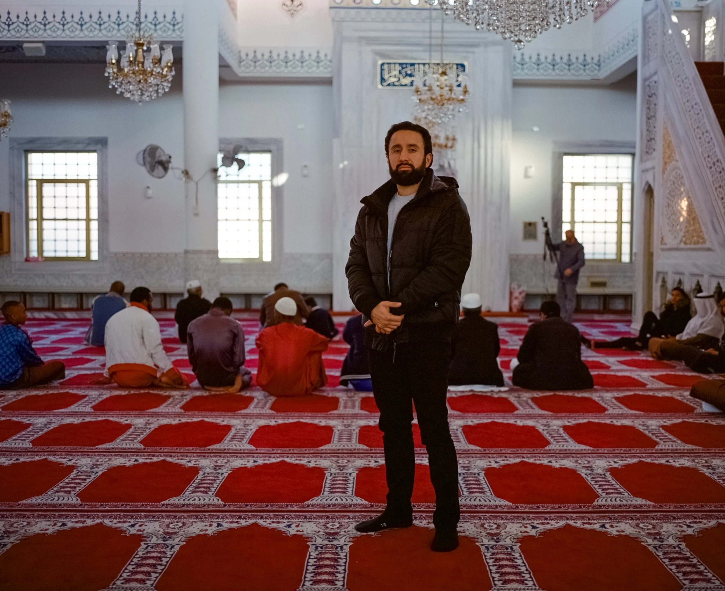 Jay, an Afghan with roots from the south-east of the country in the province of Laghman, stands for a portrait after Eid Al Adha prayers in the Ottoman inspired Gallipoli Mosque, Auburn NSW. The child of Afghan refugees as a result of the Soviet in