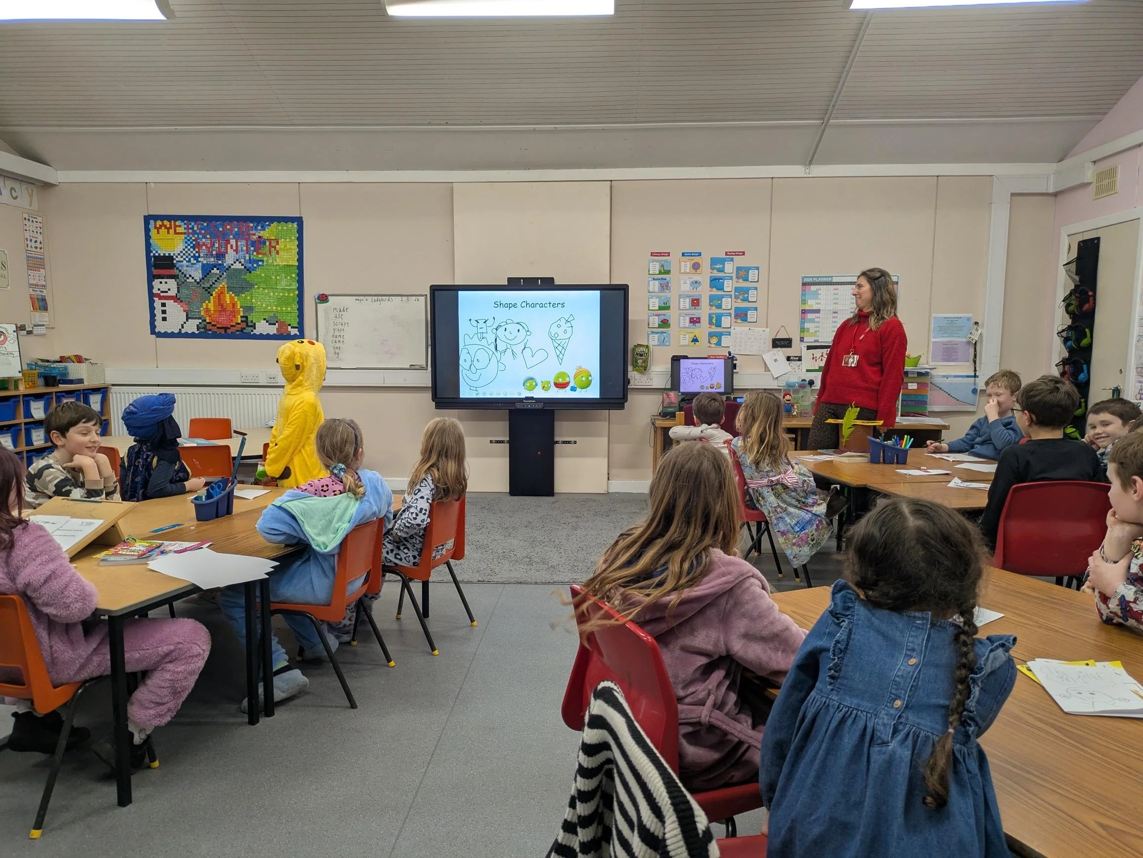 Children's Author and Illustrator Emma Clarke leading a workshop in a primary school.