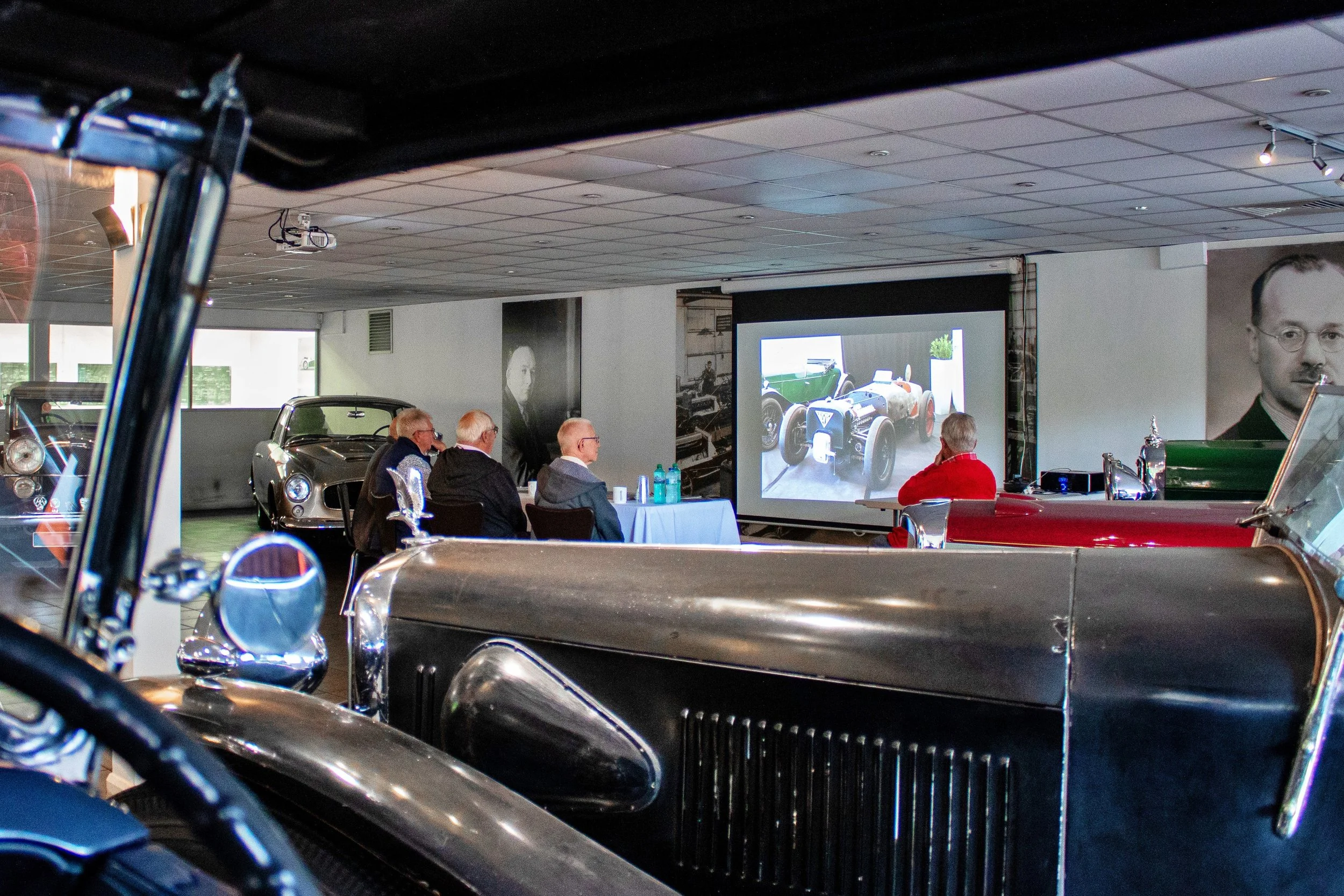 Group Being Given Talk in Showroom.jpg